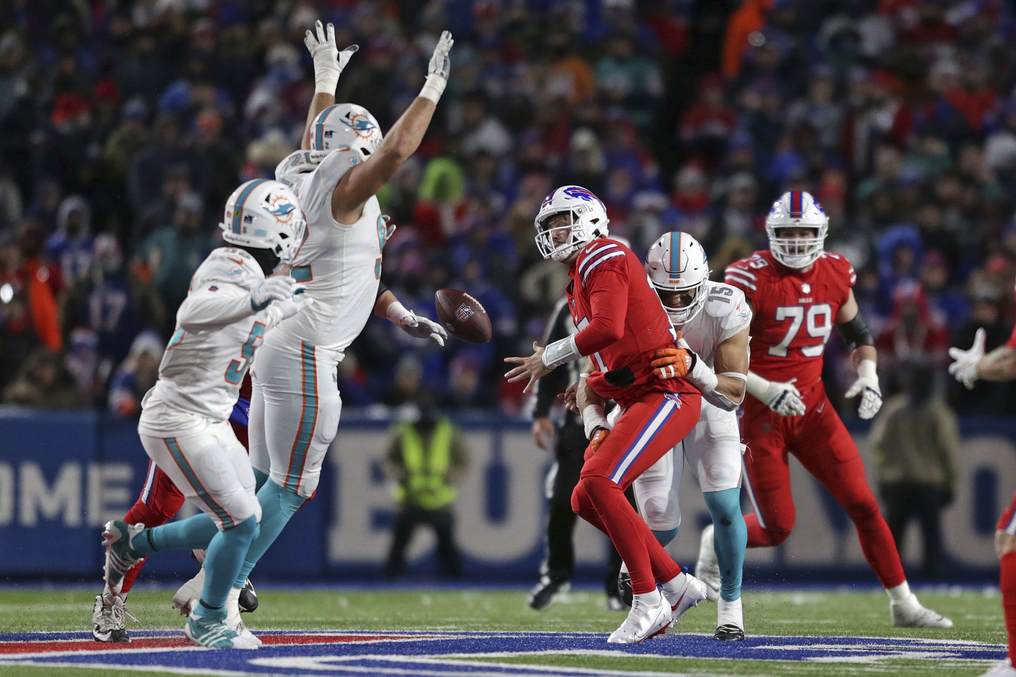 Bills beat Dolphins 32-29, clinch 4th straight playoff berth