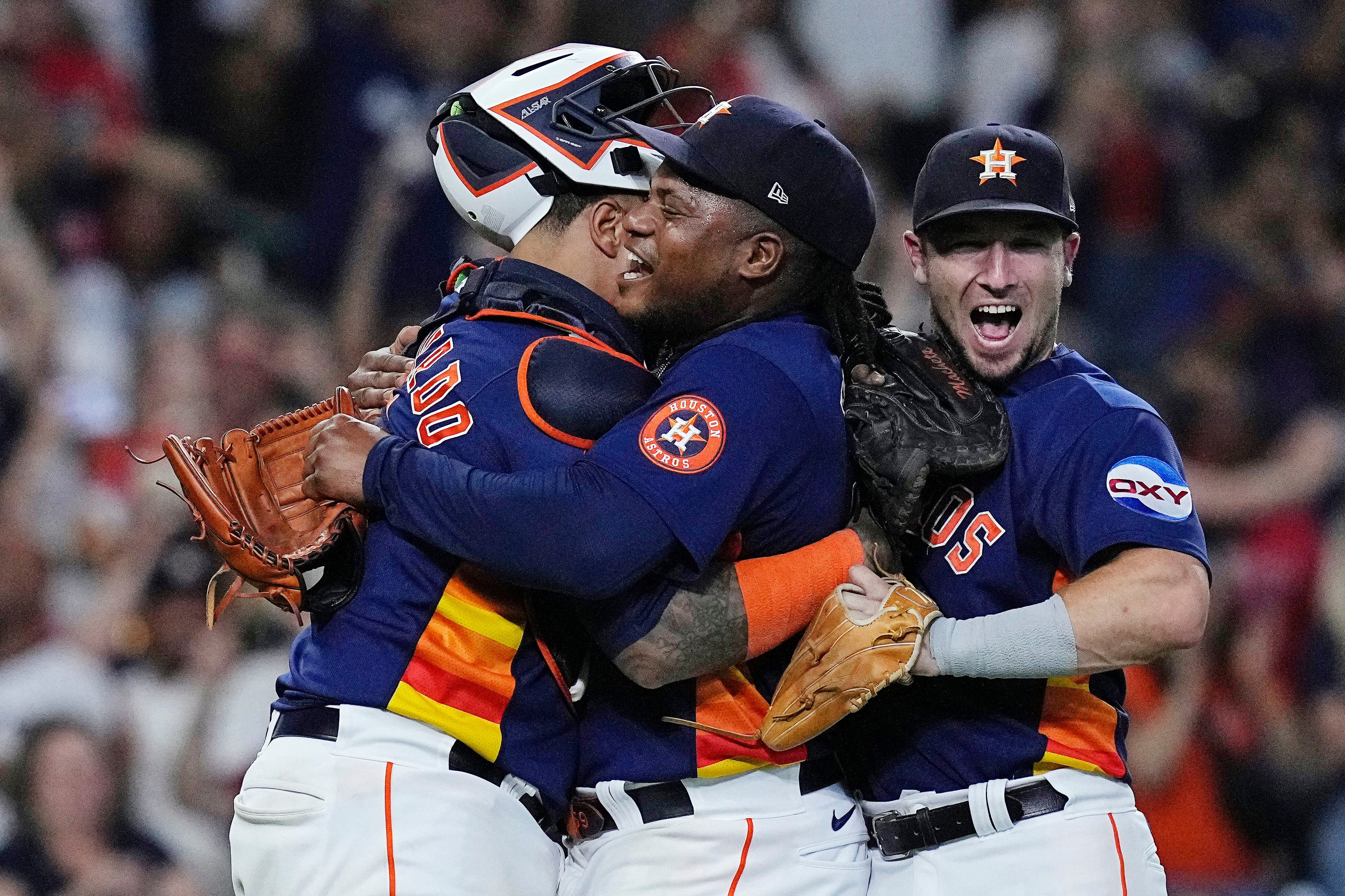 FILE - In this Sept. 4, 2019, file photo, Chicago White Sox's Jose Abreu  smiles as he is congratulated by teammates after he hit a two-run home run  during the eighth inning