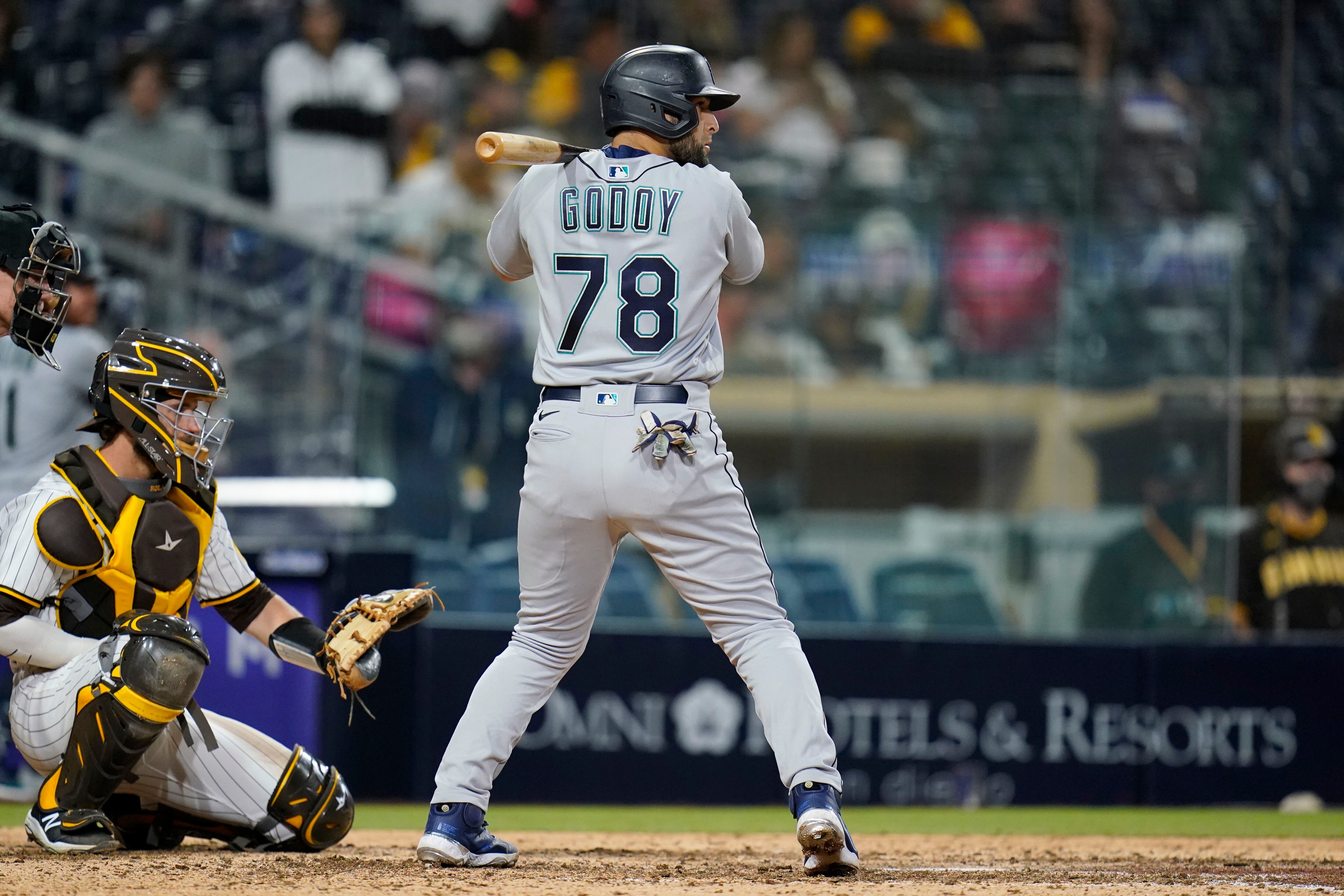 Seattle Mariners' Jose Godoy draws a walk during the ninth inning of a  baseball game against the San Diego Padres, Saturday, May 22, 2021, in San  Diego. When Godoy made his big