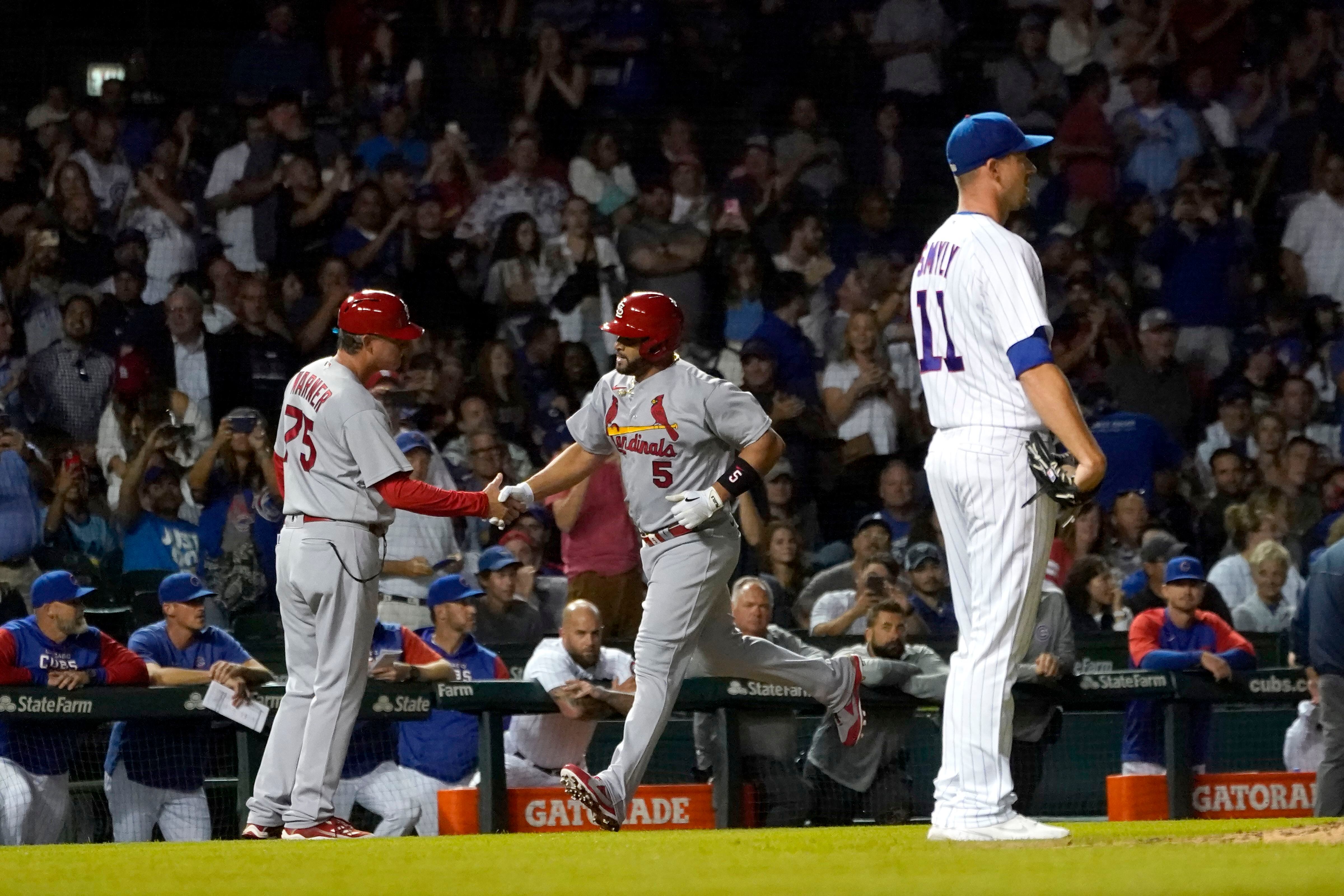 Pujols hits 693rd home run, ties one Bonds record