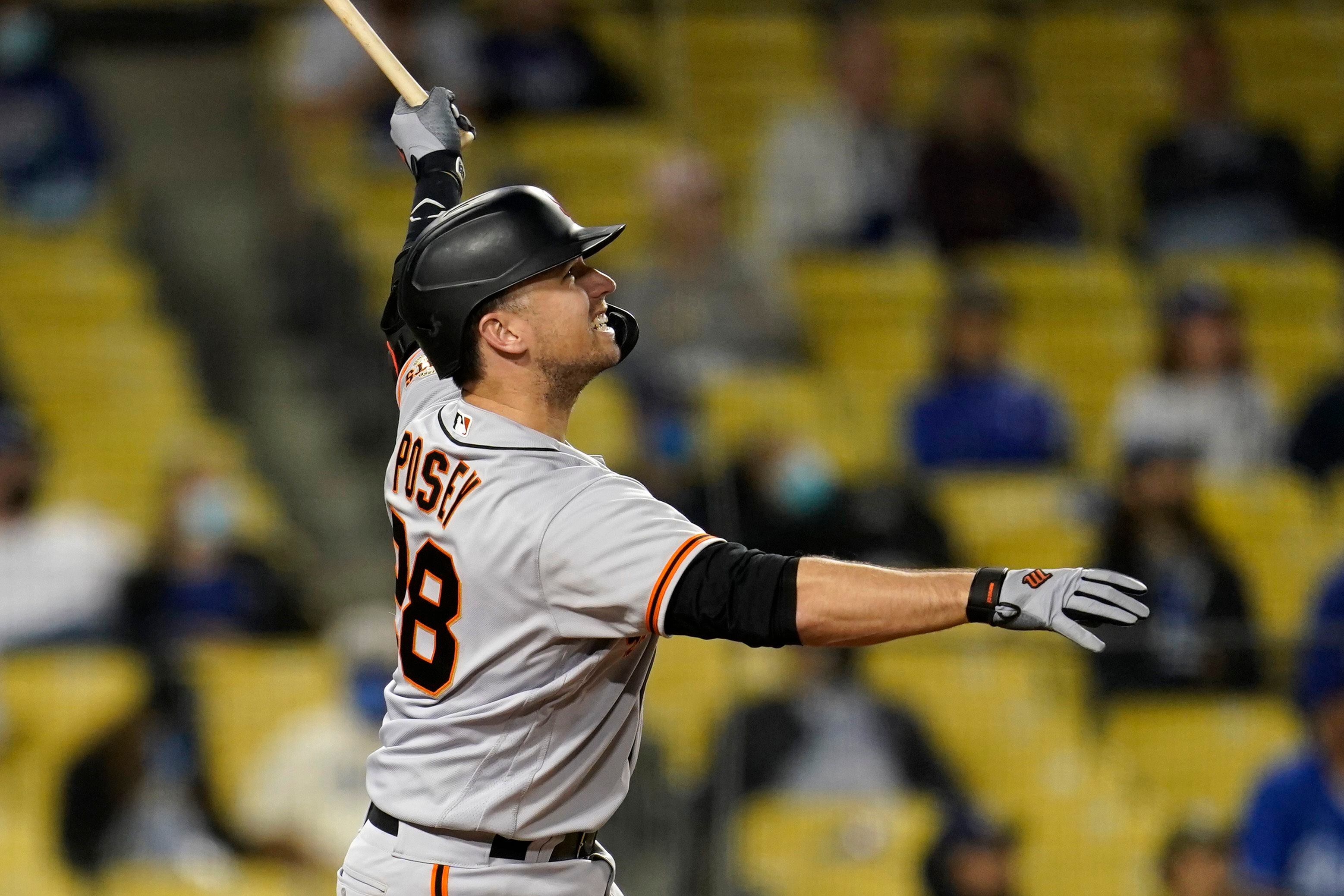 Giants' Buster Posey continues hot start with his first two-homer