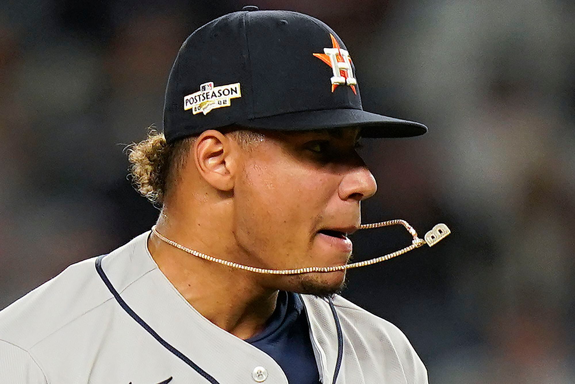 Houston Astros catcher Christian Vazquez (9) and relief pitcher Bryan Abreu  (52) celebrate after the Astros beat the New York Yankees 5-0 in Game 3 of  an American League Championship baseball series