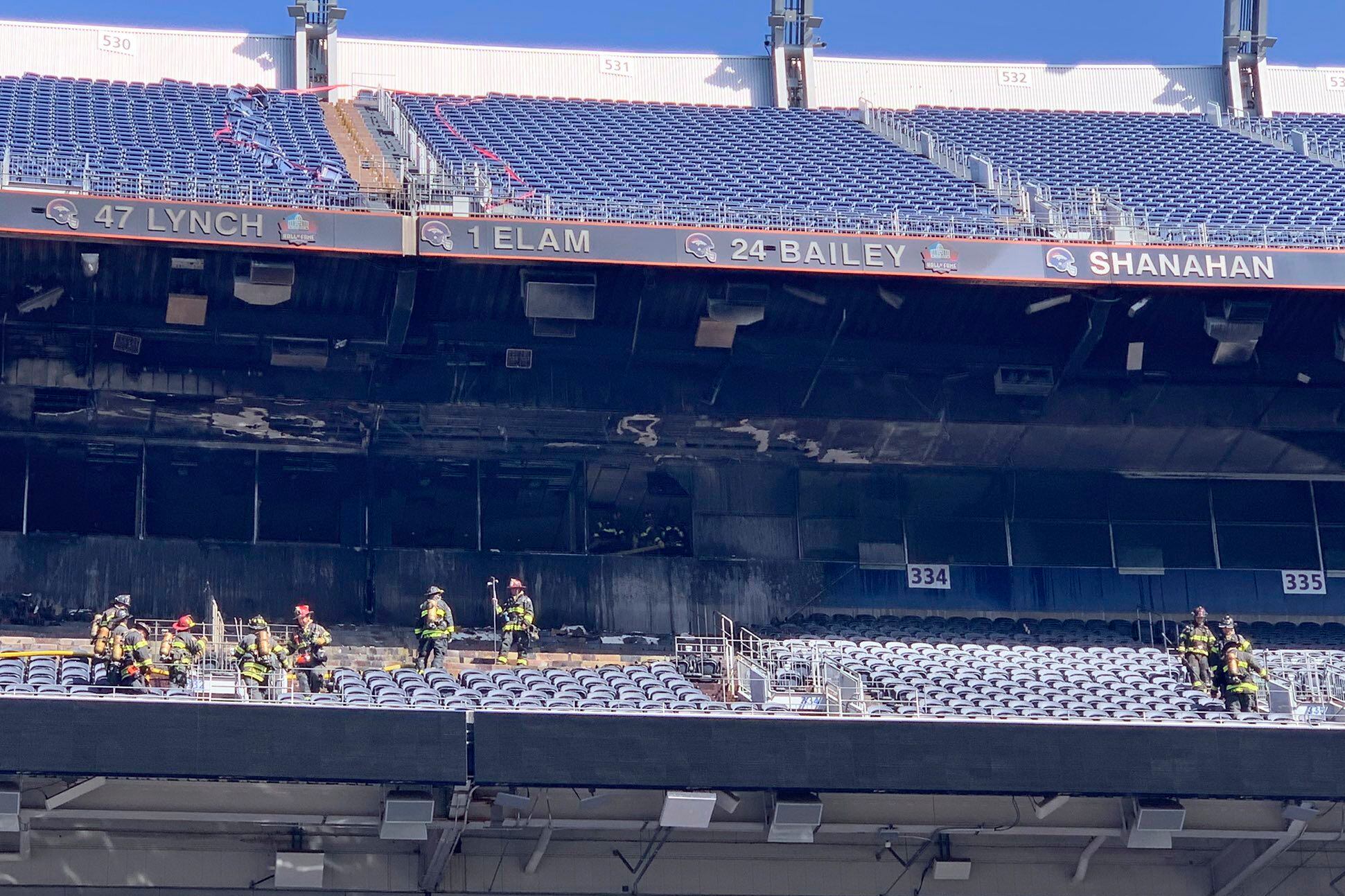 Denver Broncos stadium fire torches seats, suite area