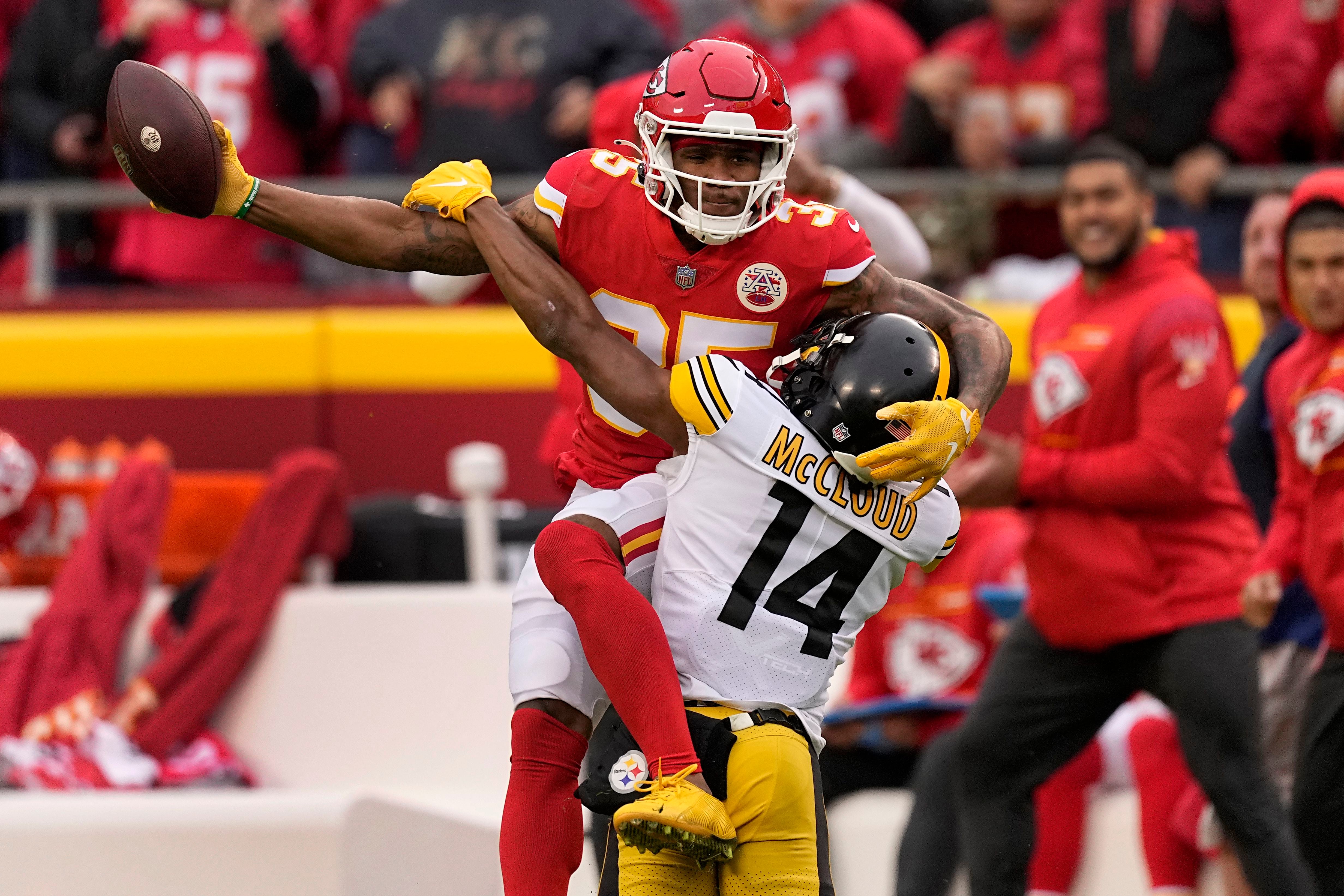 Kansas City Chiefs wide receiver Byron Pringle (13) runs down