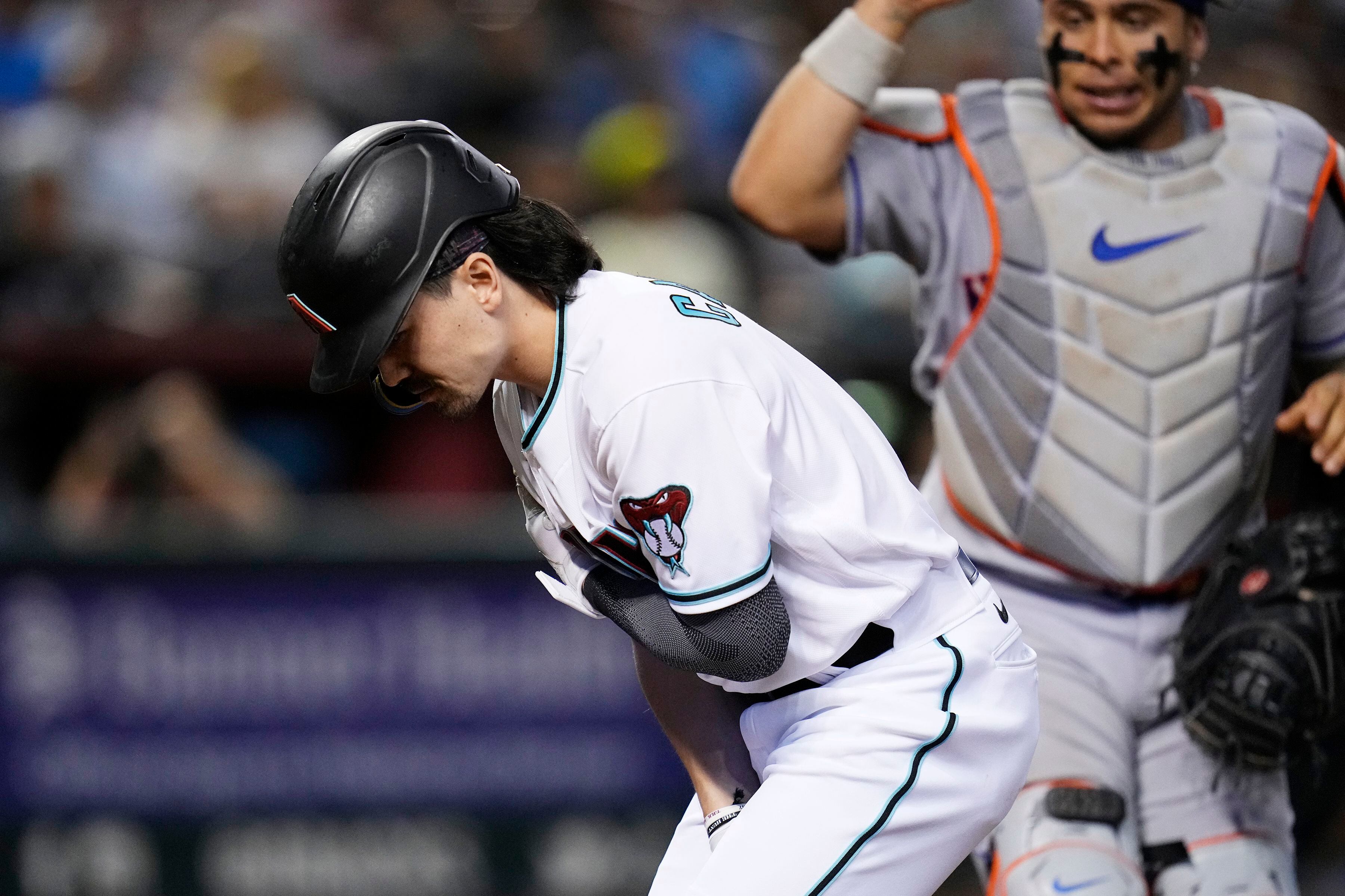 Arizona Diamondbacks left fielder Corbin Carroll looks on after the in  2023