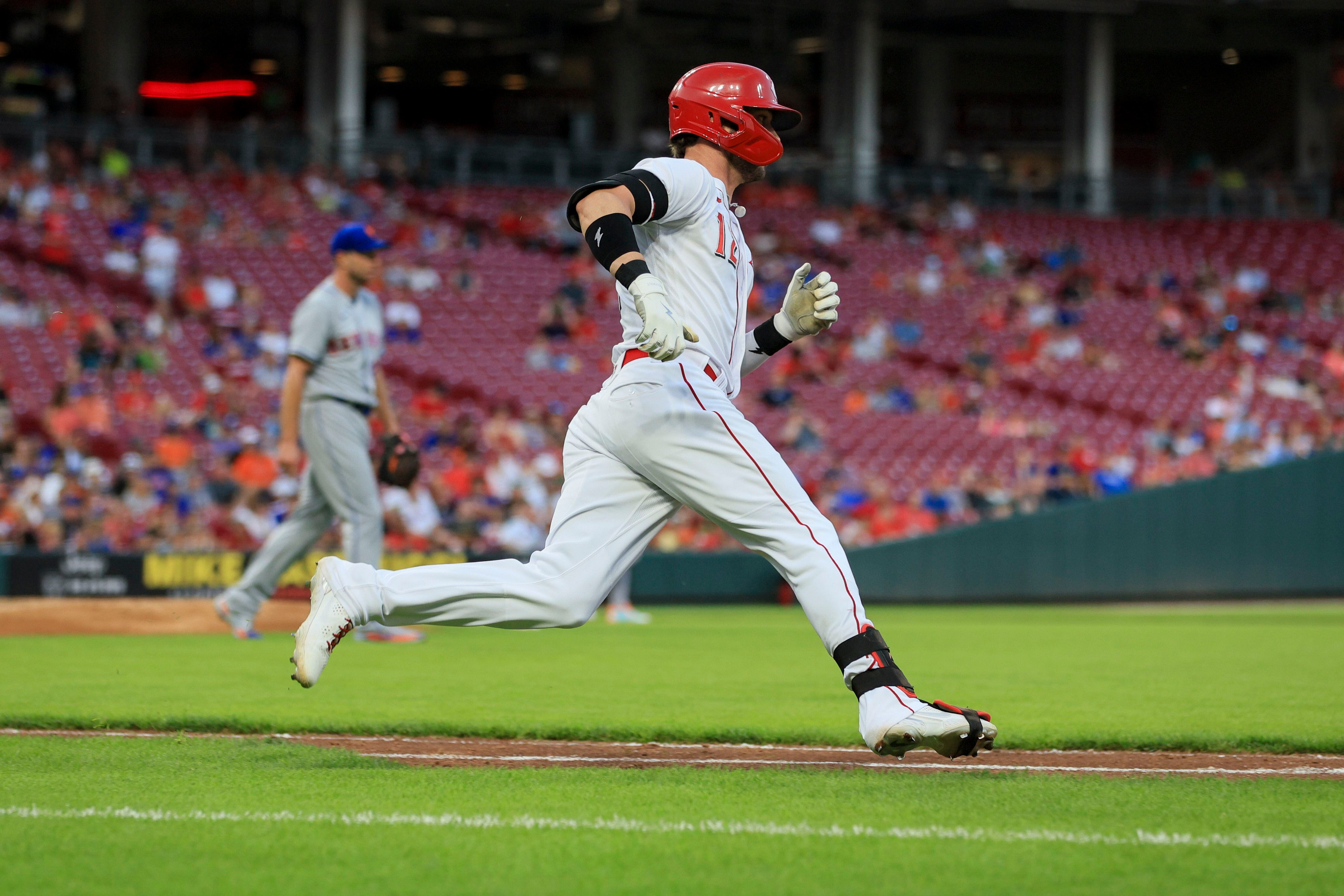 Reds send Naquin, Diehl to Mets for pair of prospects