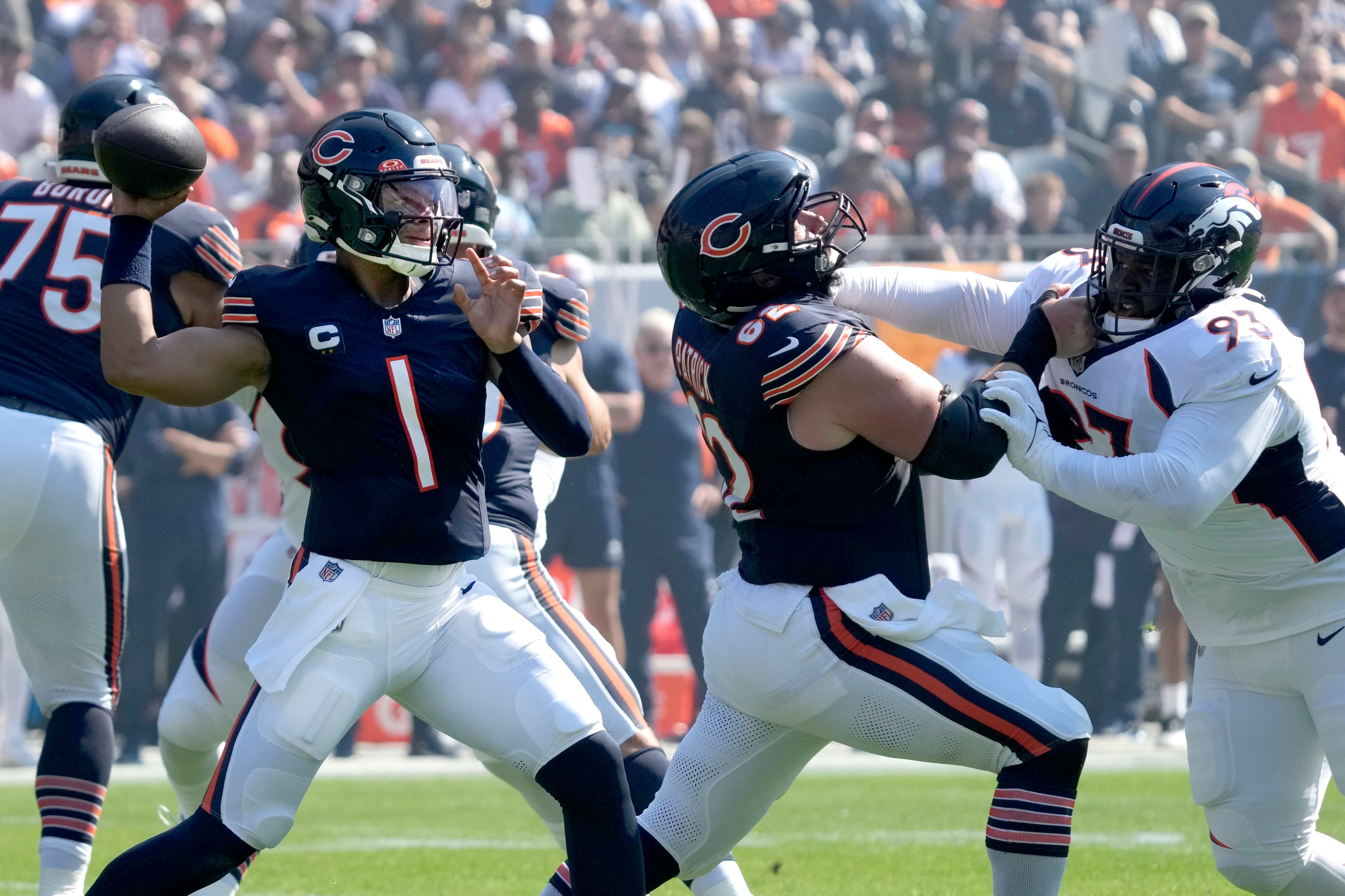 Russell Wilson throws 3 TDs, Broncos rally from 21 down to top Bears 31-28, World