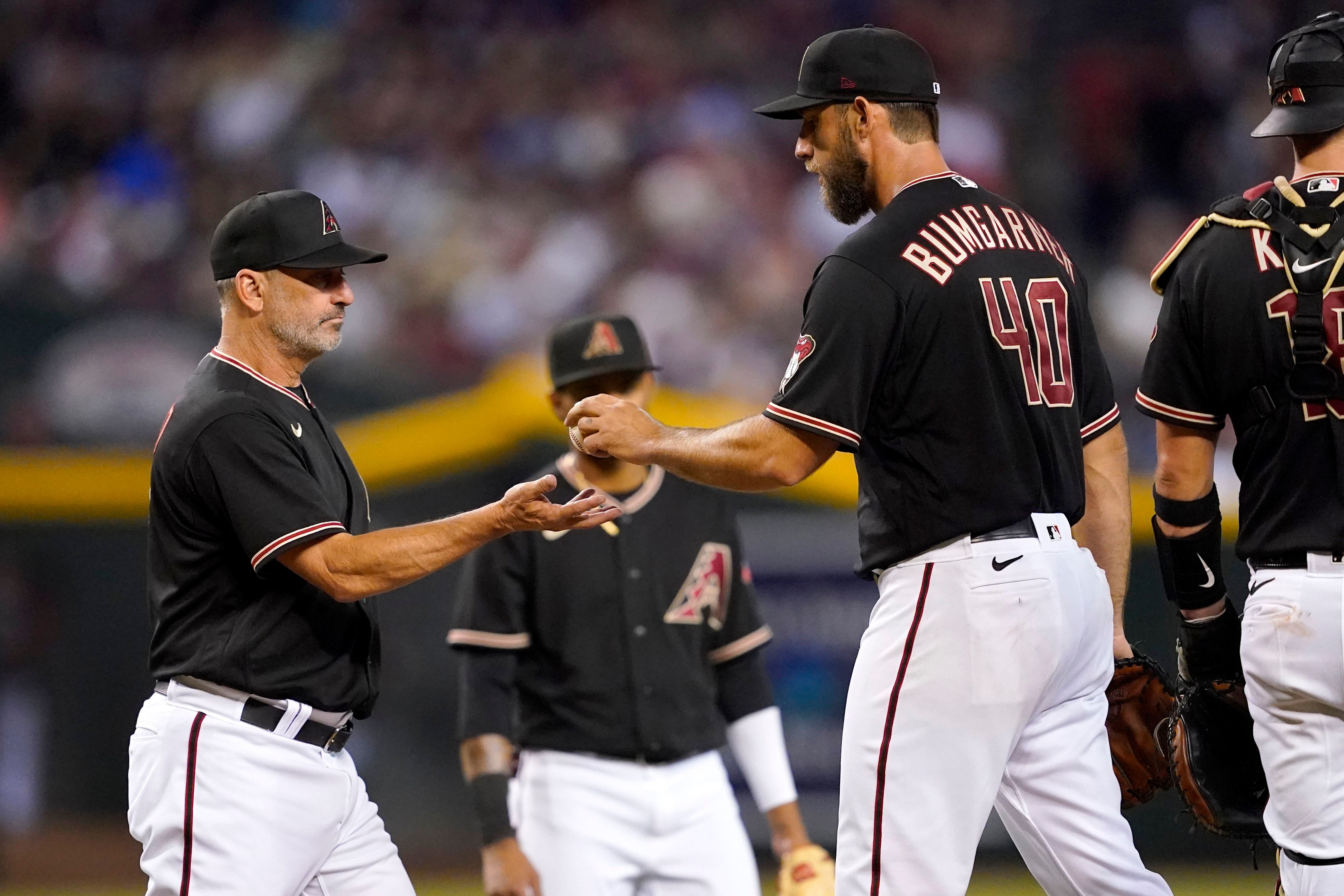 Pujols homers twice, Cardinals pile on D-backs in 16-7 victory