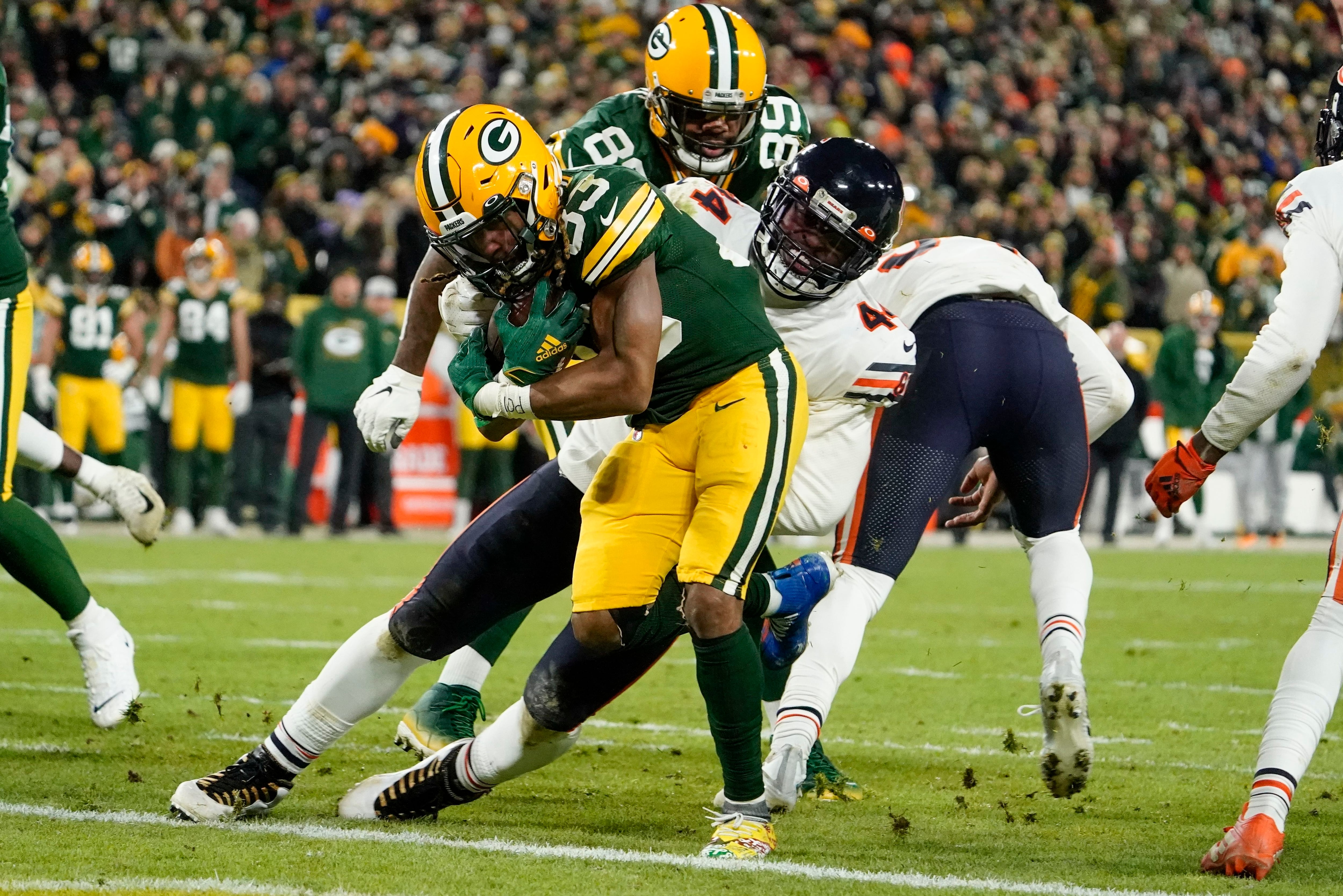 Rodgers throws 4 TD passes, Packers defeat Bears 45-30