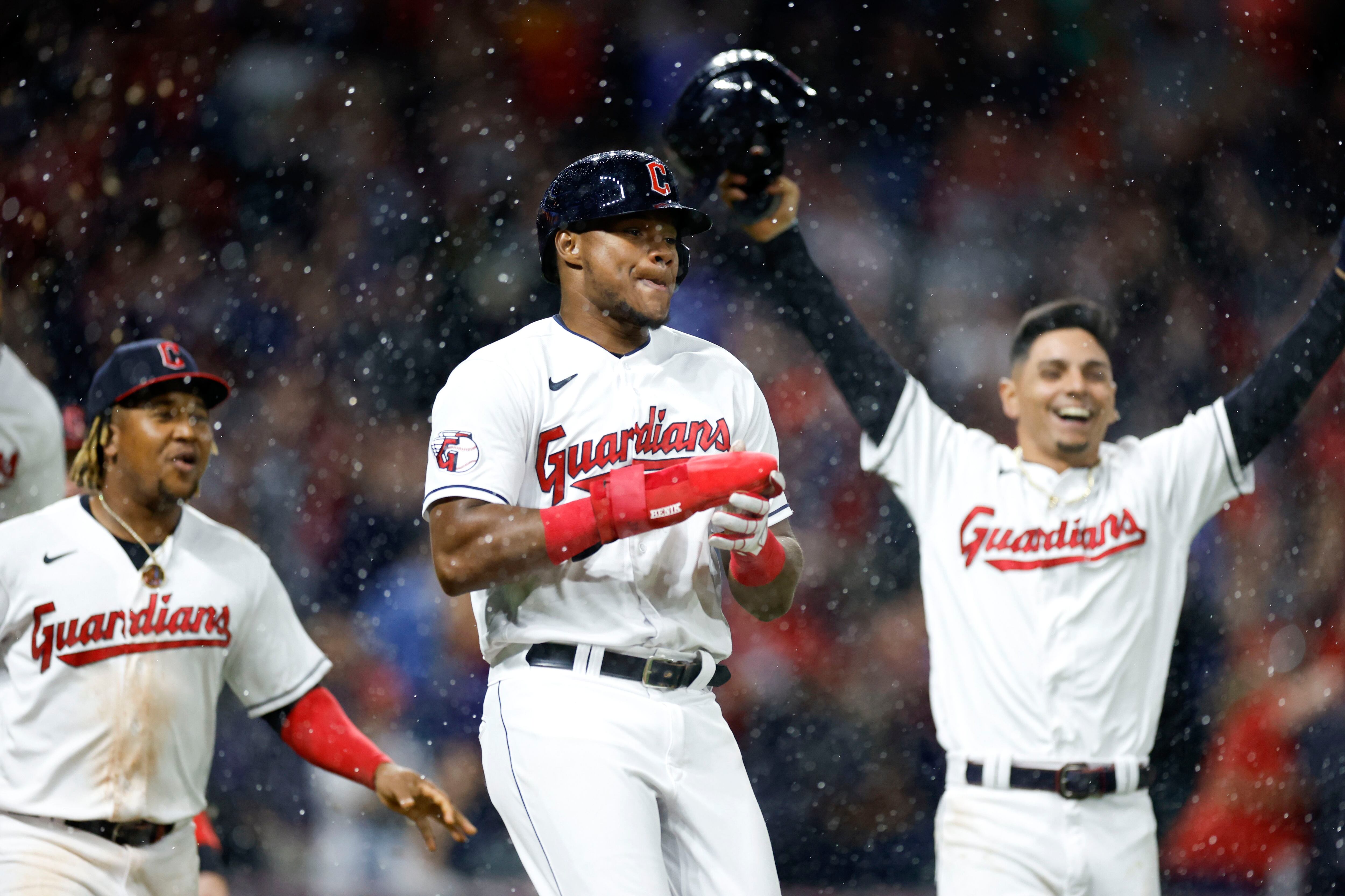 Cleveland Guardians' Josh Naylor, left, and Steven Kwan celebrate