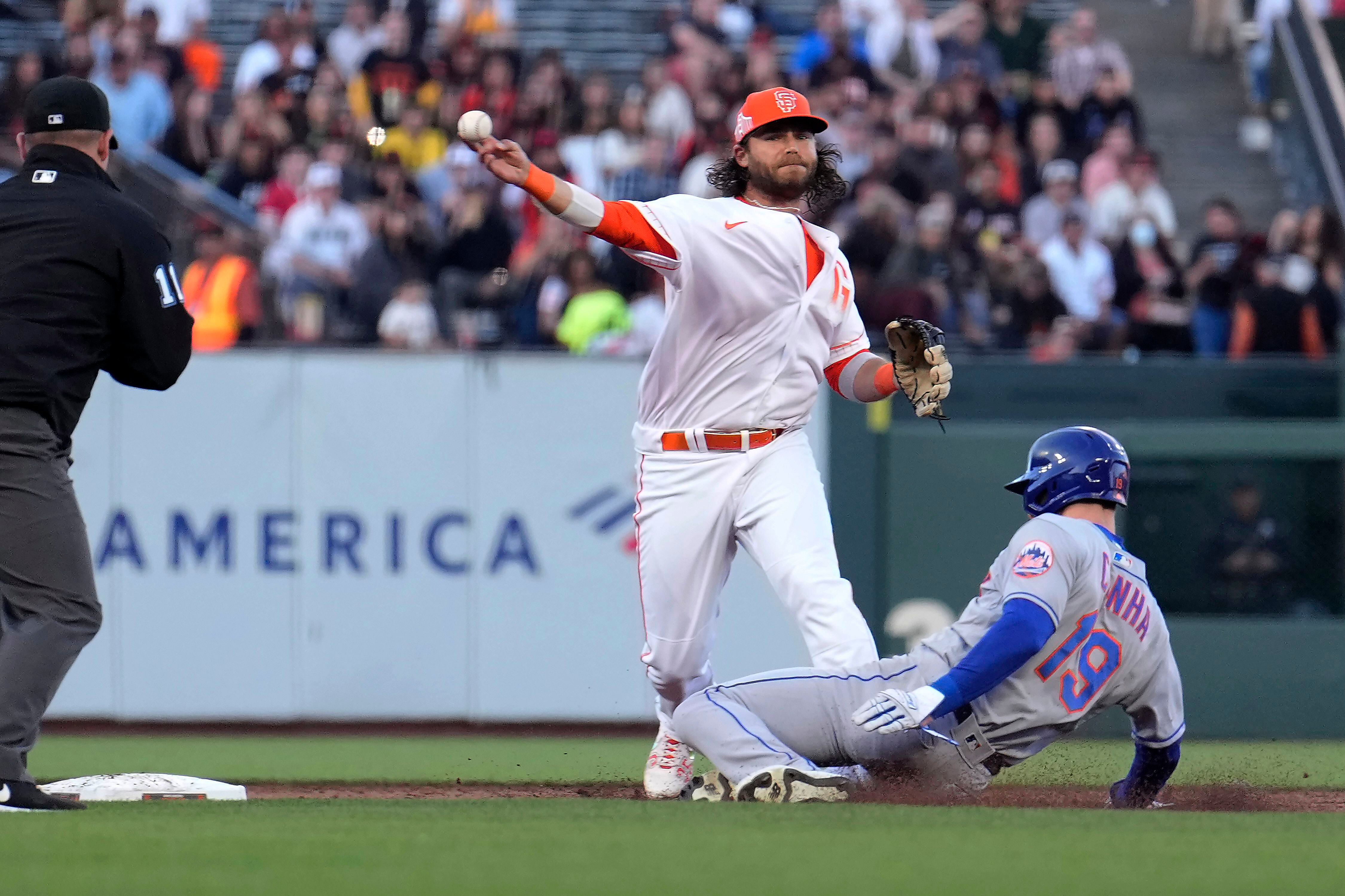 San Francisco Giants starting pitcher John Brebbia throws to the plate  during the first inning of a baseball game against the Los Angeles Dodgers  Tuesday, Sept. 6, 2022, in Los Angeles. (AP