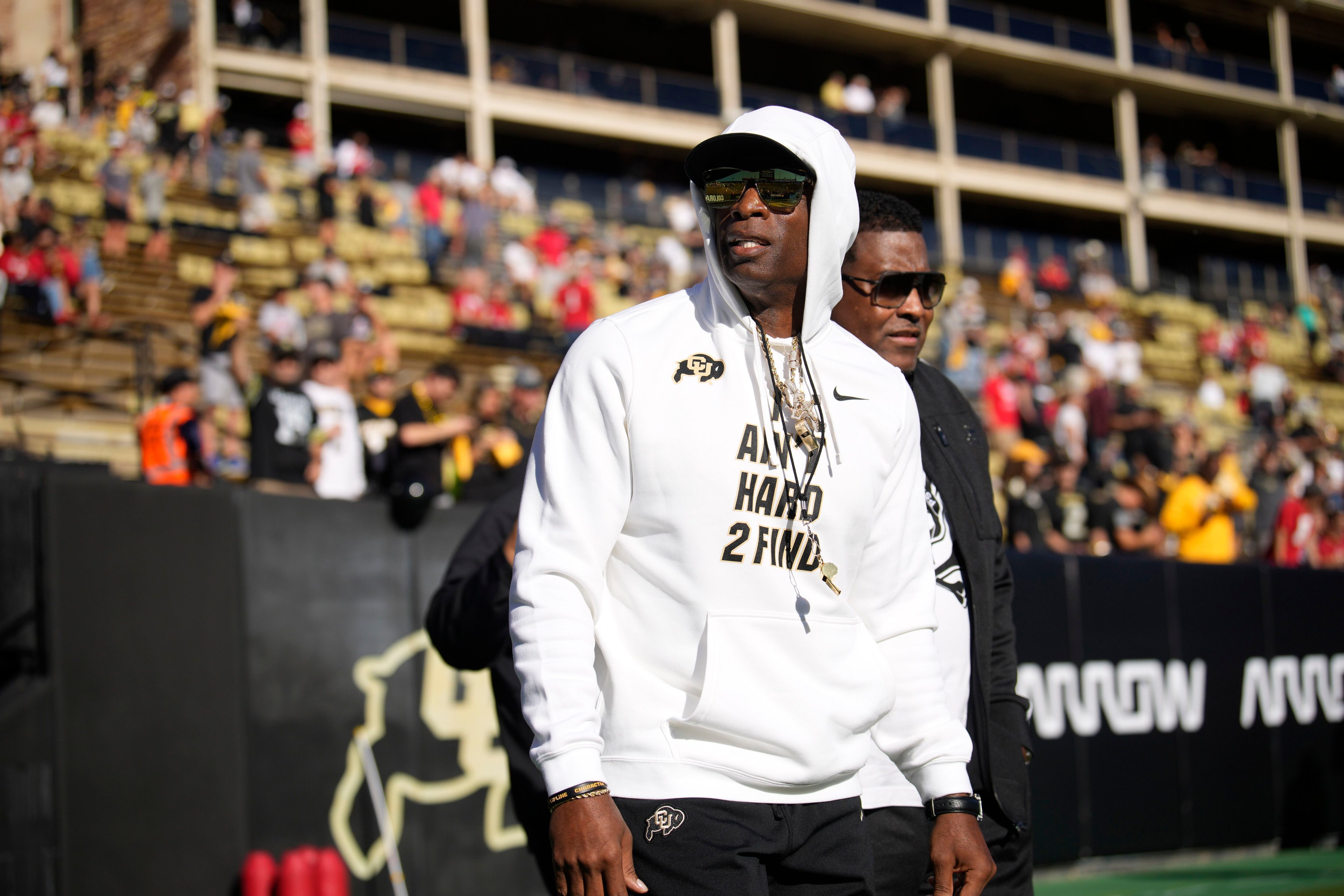 Deion has been wearing sunglasses and hats in interviews for 35 years! 😎  #CFB #Colorado 