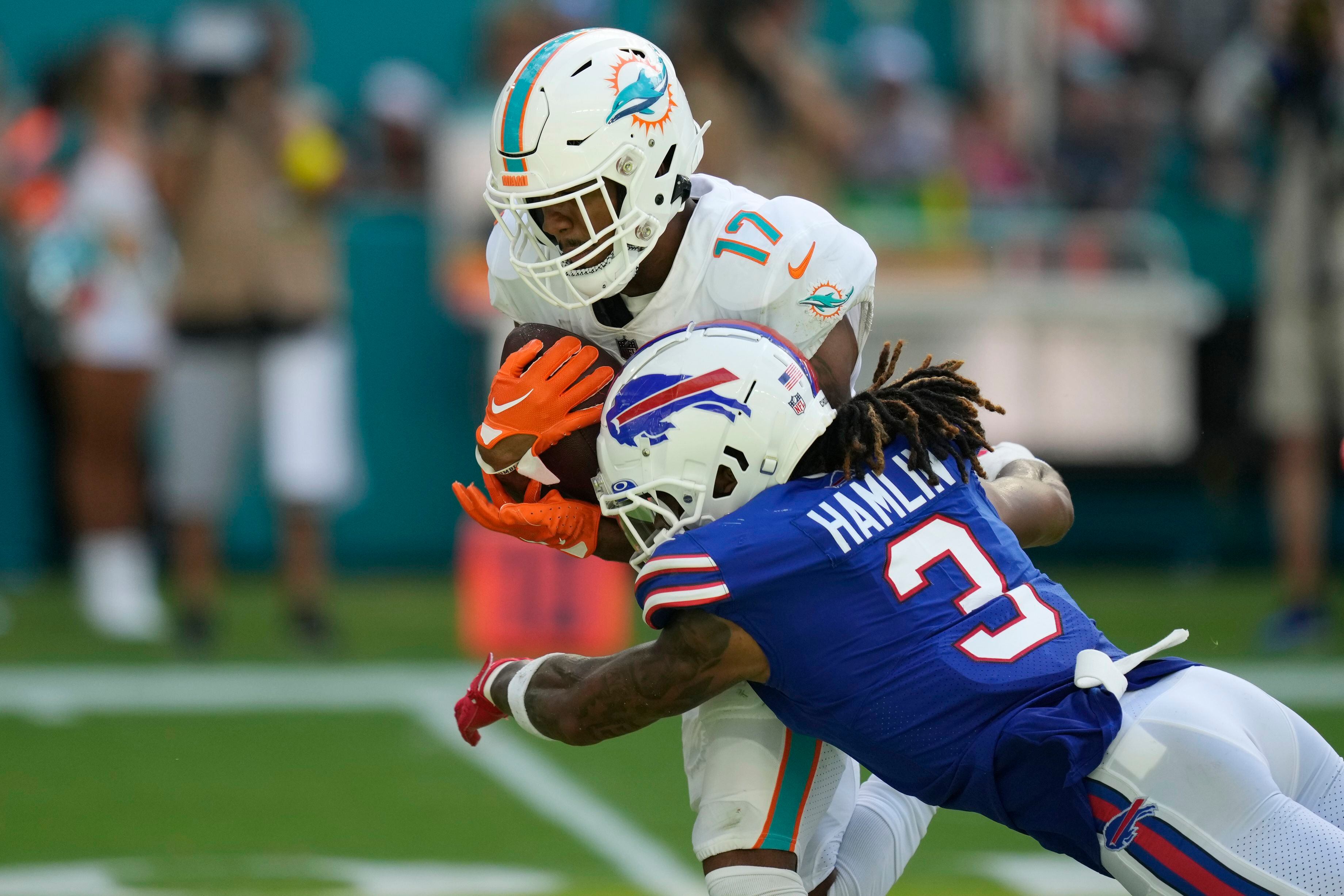 Dolphins halt Allen, survive 'butt punt' to beat Bills