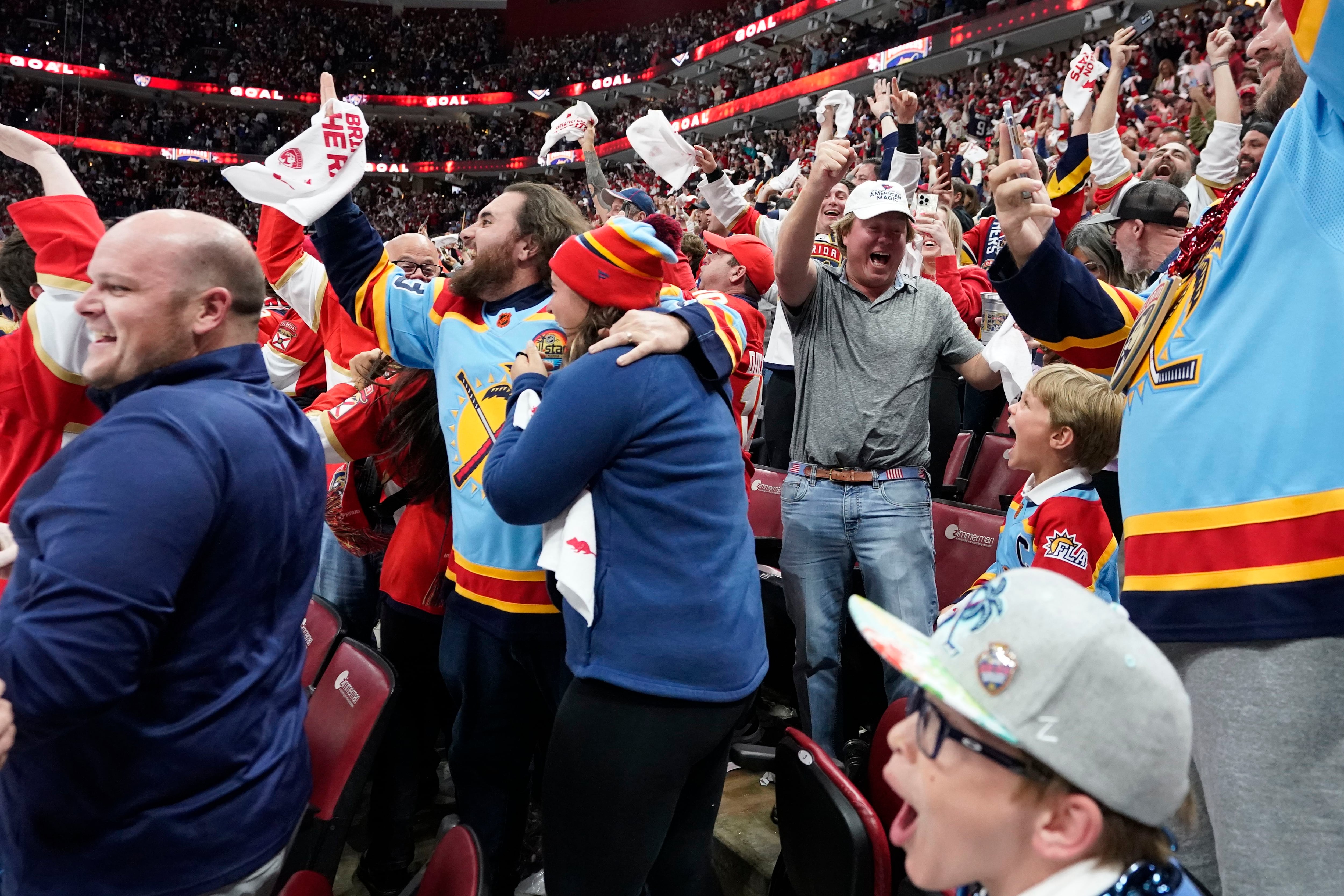 Florida Panthers left wing Matthew Tkachuk (19) continues to celebrate his  goal as he skates towards the bench during the third period of an NHL  hockey game against the Washington Capitals, Saturday