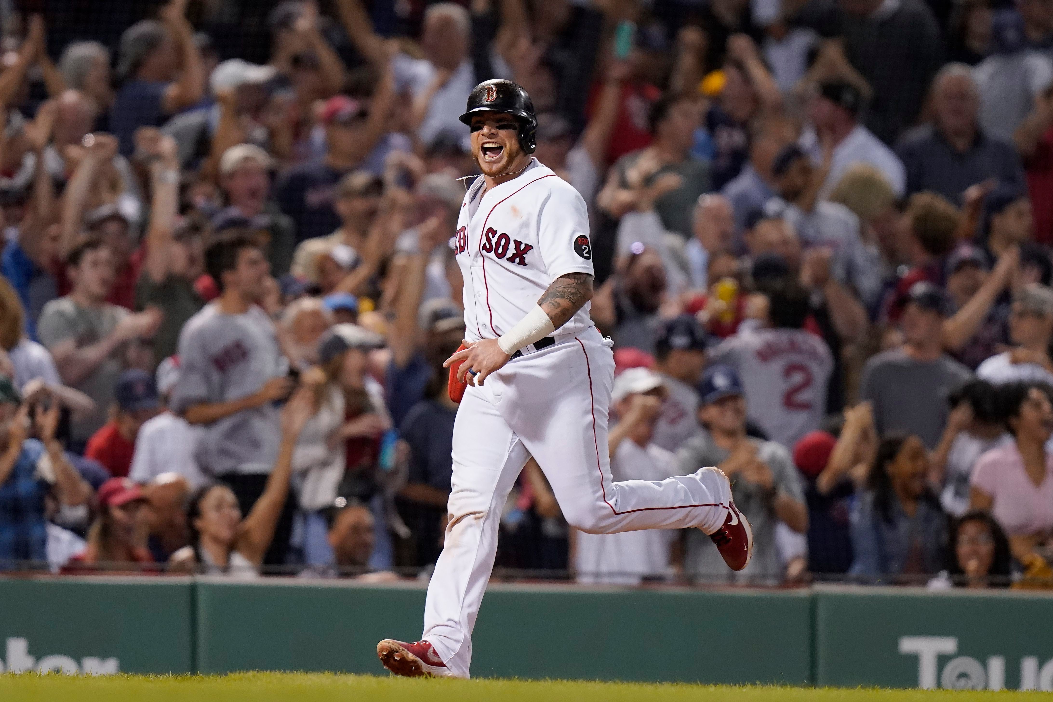 Devers breaks tie in 6-run 8th, Red Sox beat Reds 8-2 to avoid