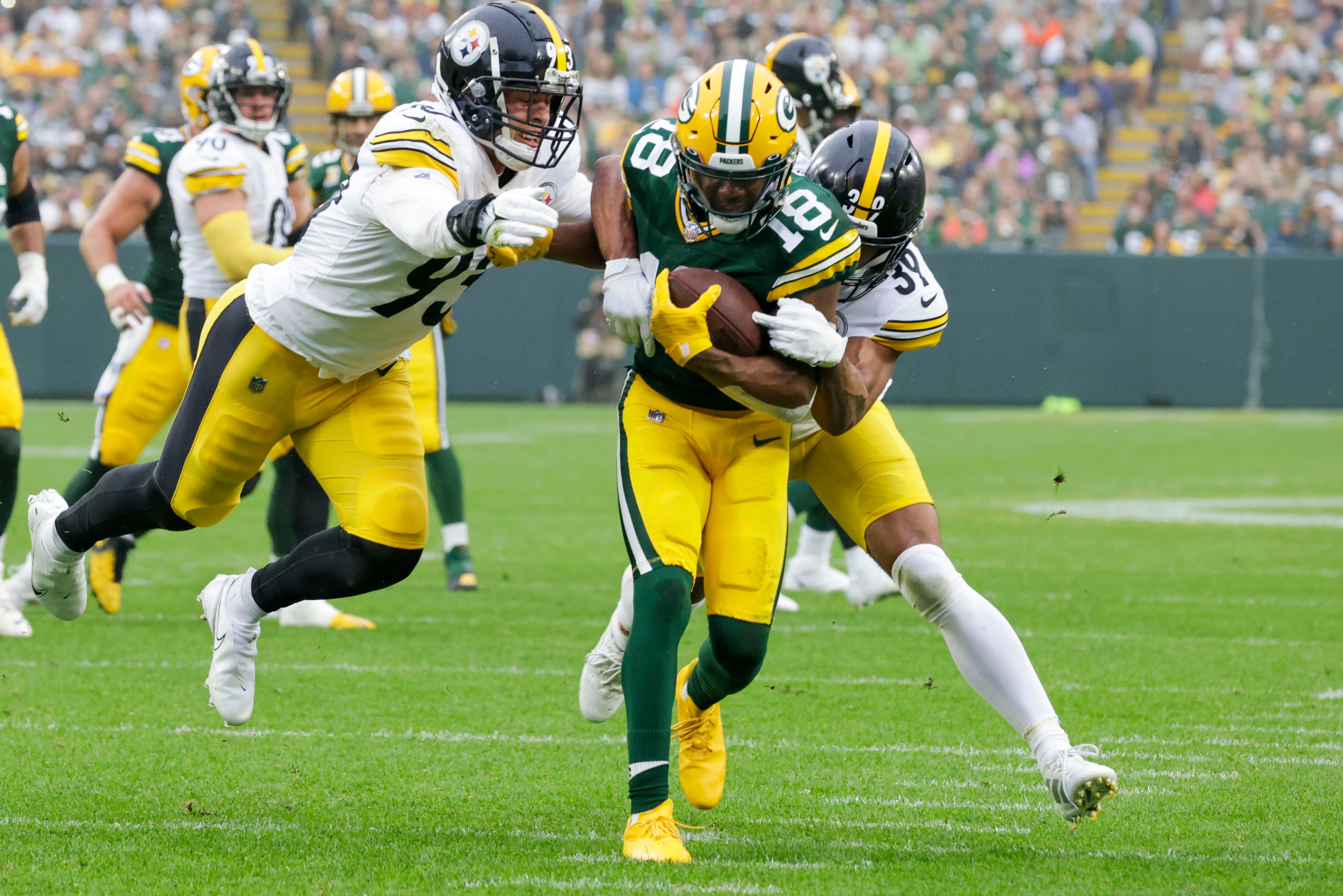 Green Bay Packers wide receiver Randall Cobb (18) reacts after making  yardage during the first quarter of an NFL game between the New York Giants  and the Green Bay Packers at the