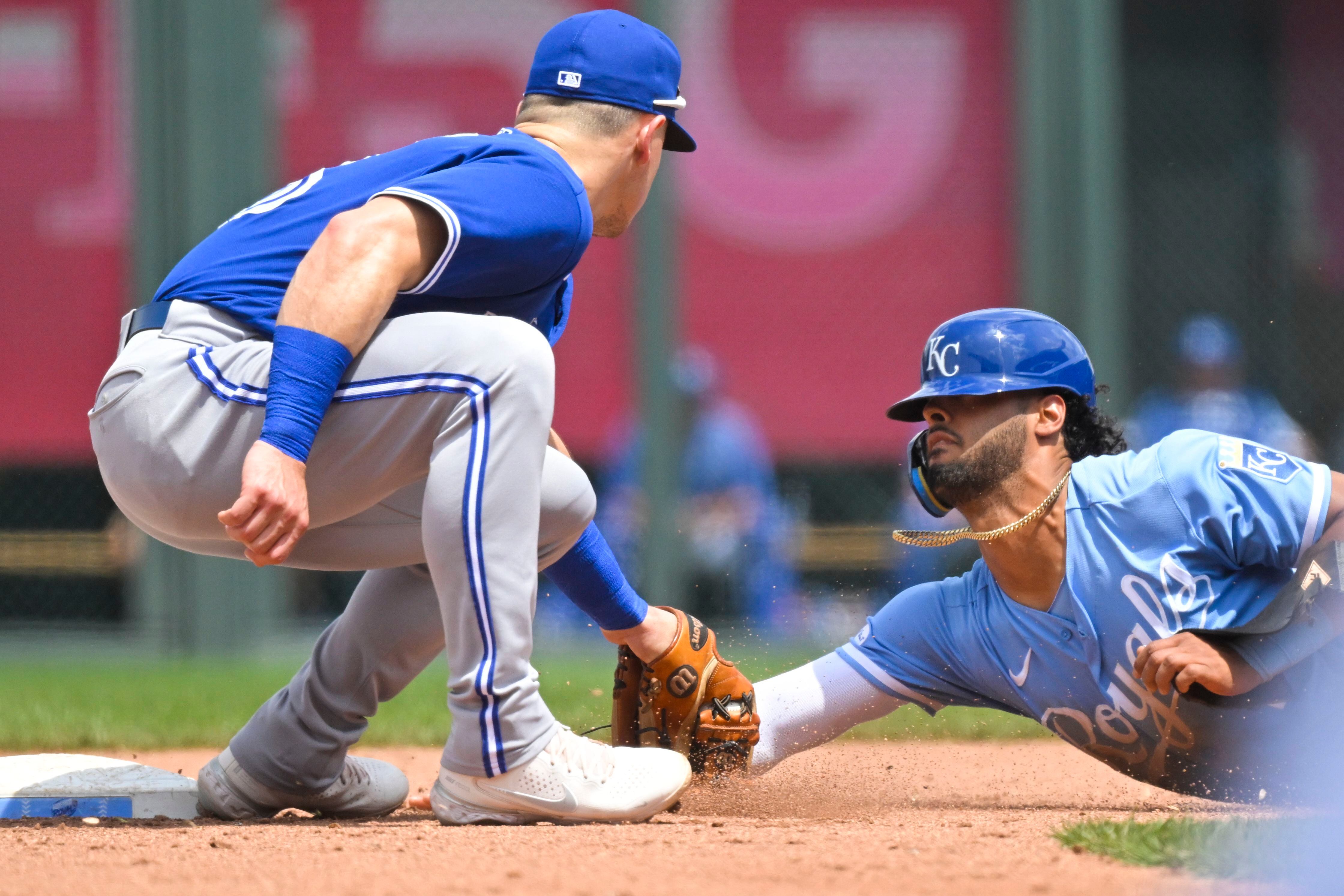 Toronto Blue Jays' Whit Merrifield runs to first base for a single during  the sixth inning of a baseball game against the Kansas City Royals in  Kansas City, Mo., Thursday, April 6