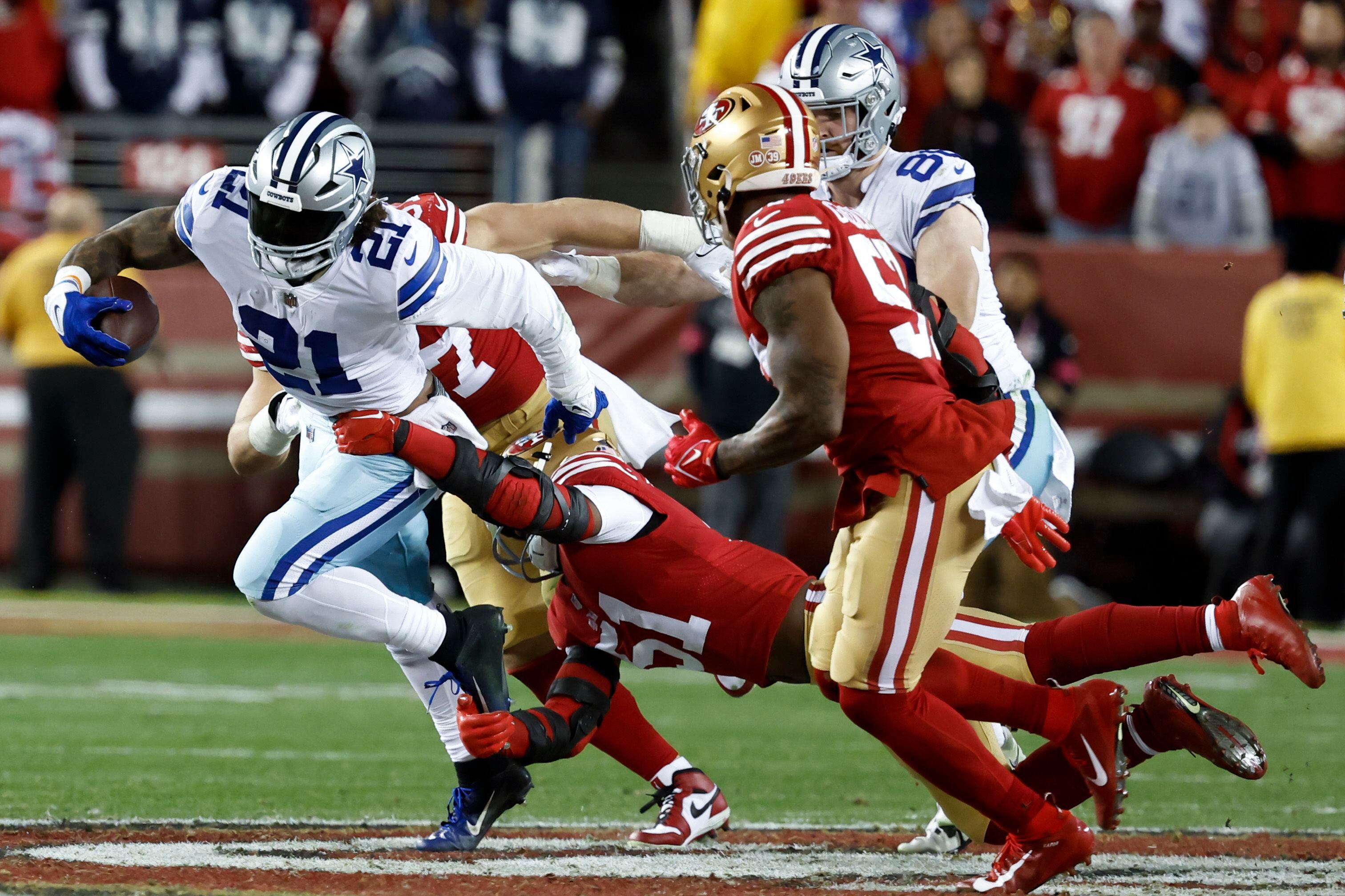 Dallas Cowboys linebacker Micah Parsons (11) and wide receiver CeeDee Lamb  (88) walk off the field after the first half of an NFL divisional round  playoff football game against the San Francisco