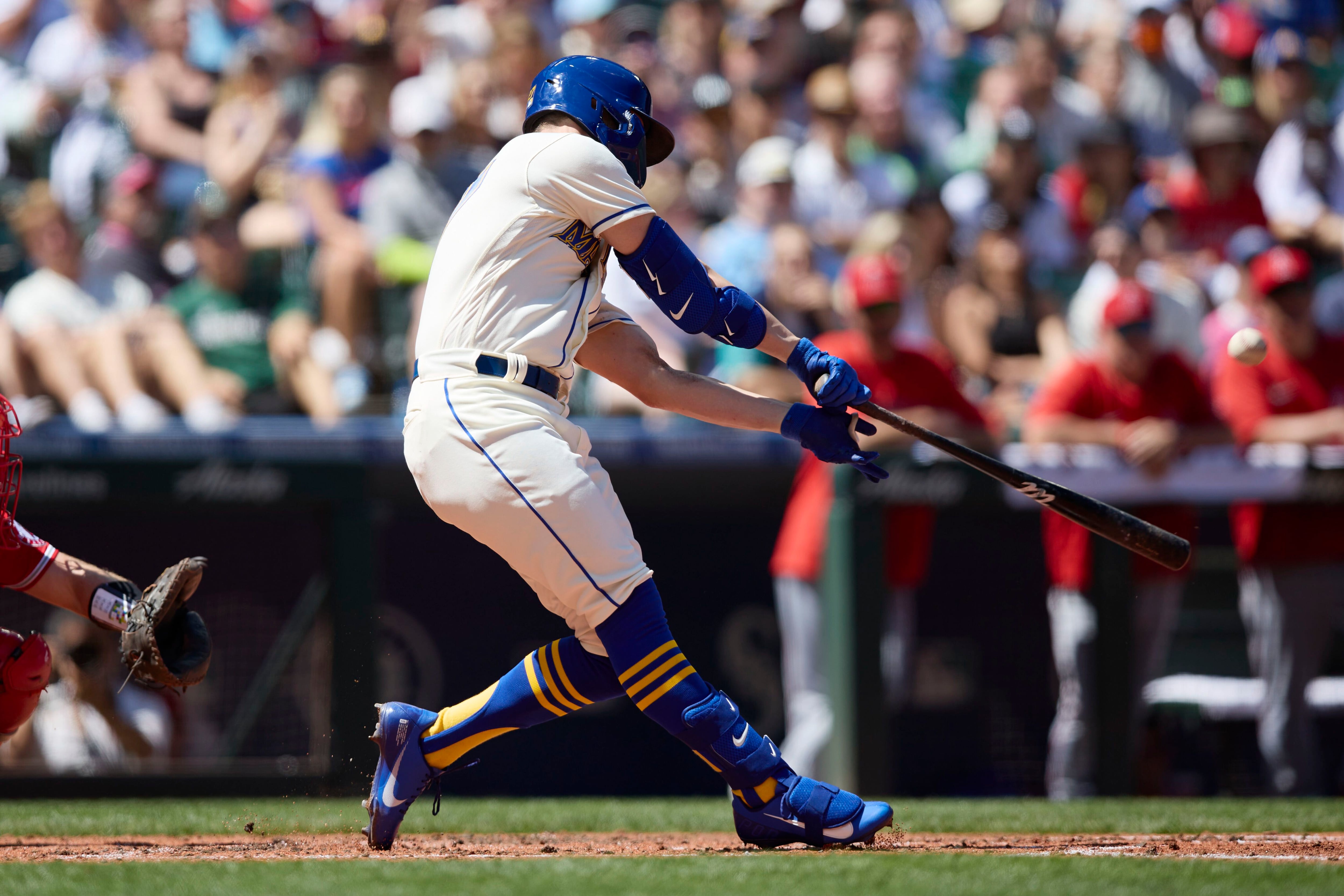 Seattle Mariners' Ty France removes his batting gear after