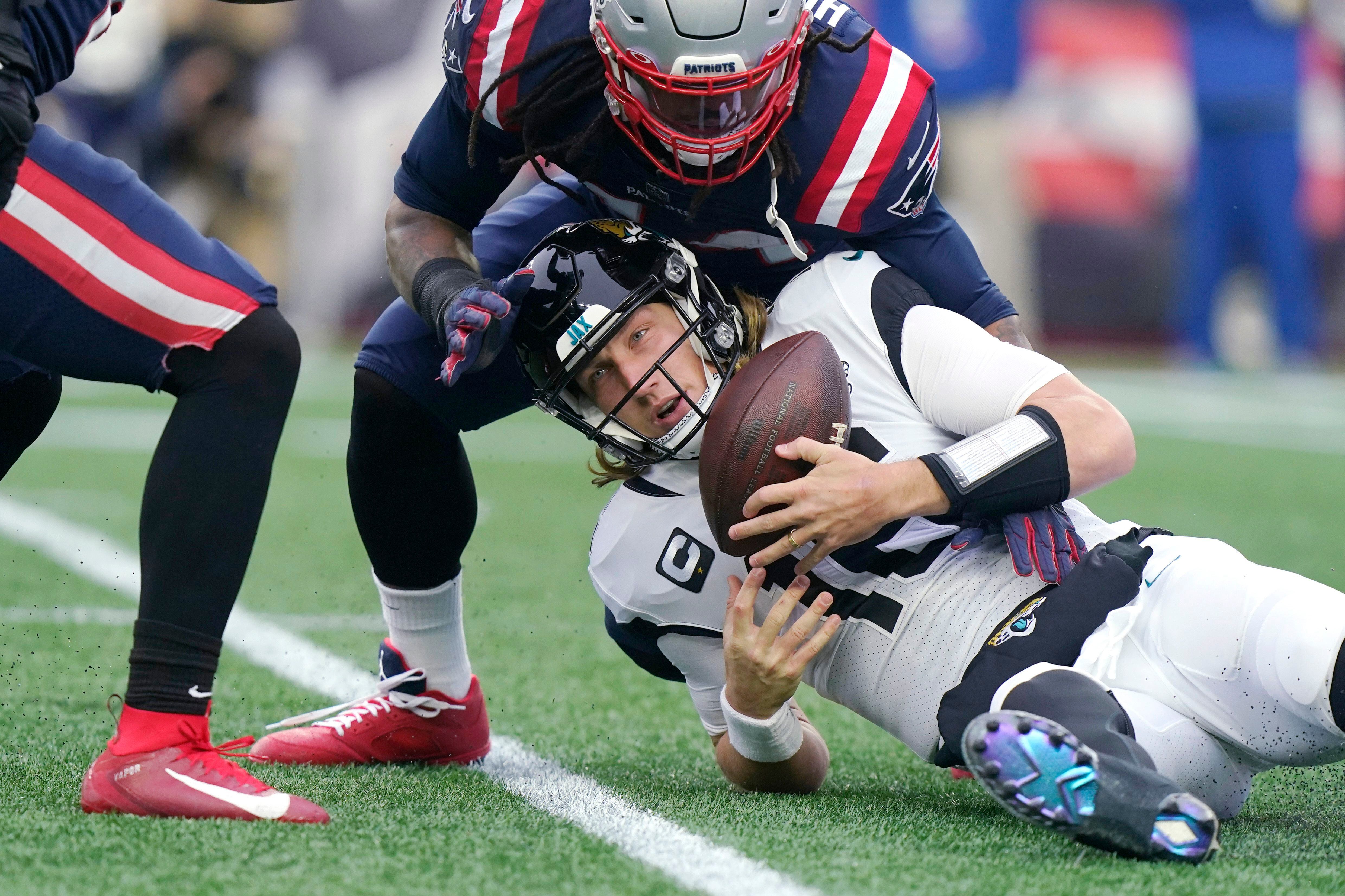 Patriots blow past Jaguars 50-10, earn playoff berth