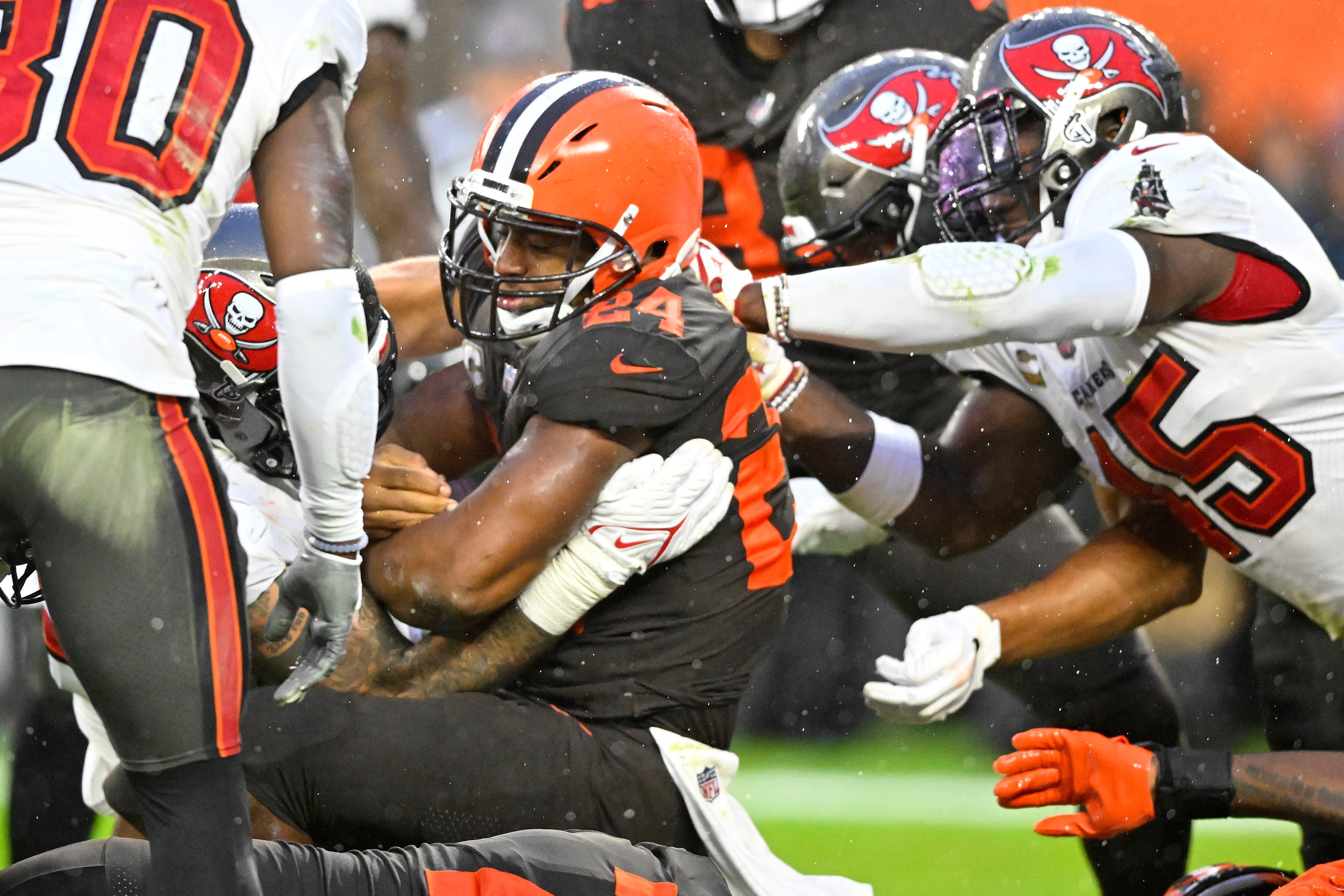 Cleveland Browns defensive end Myles Garrett (95) celebrates after sacking  Tampa Bay Buccaneers quarterback Tom Brady (12) during the second half of  an NFL football game in Cleveland, Sunday, Nov. 27, 2022.