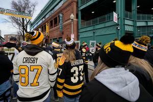 Bruins arrive at Fenway Park in vintage Red Sox jerseys ahead of