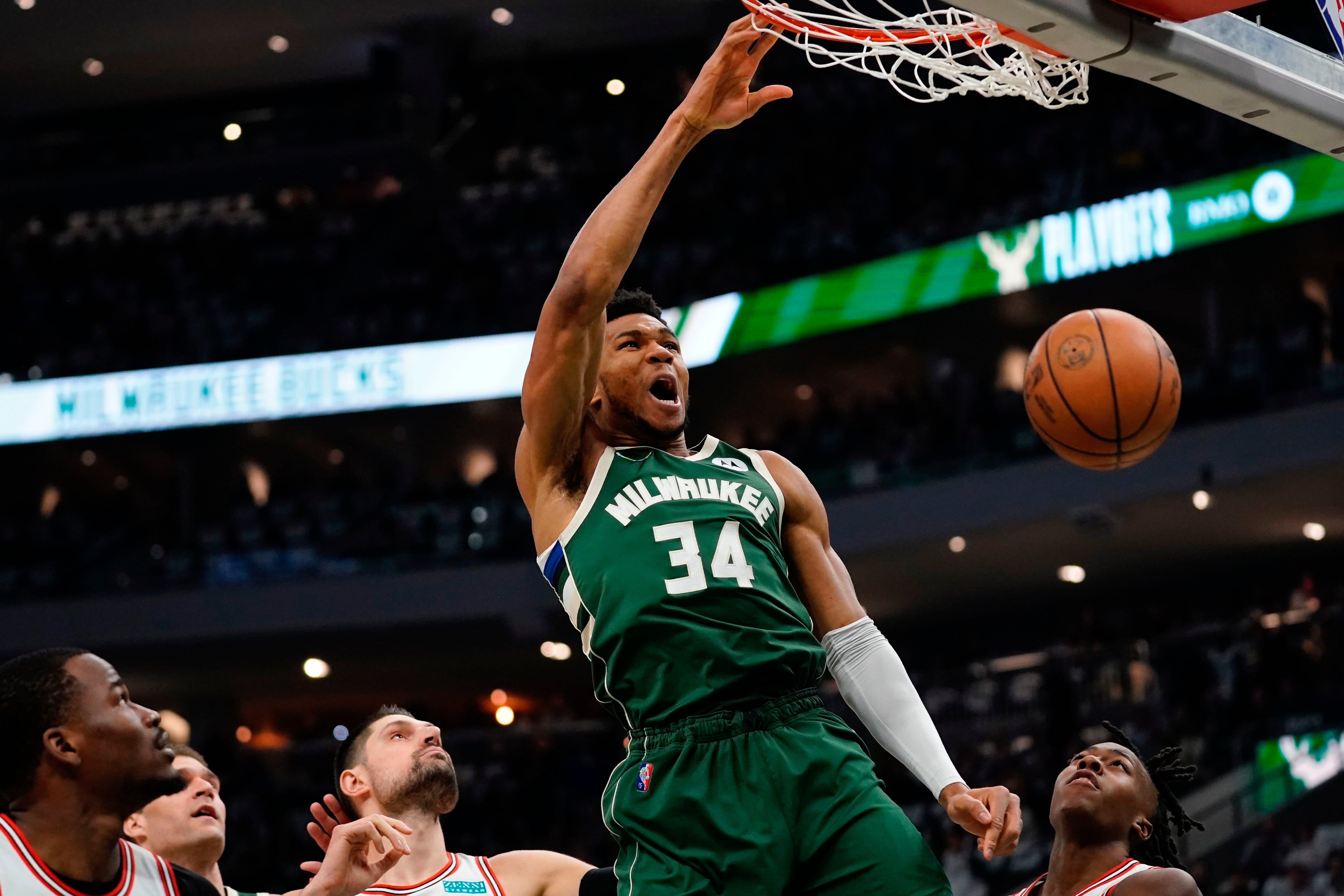 giannis antetokounmpo dunks from outside the three point line