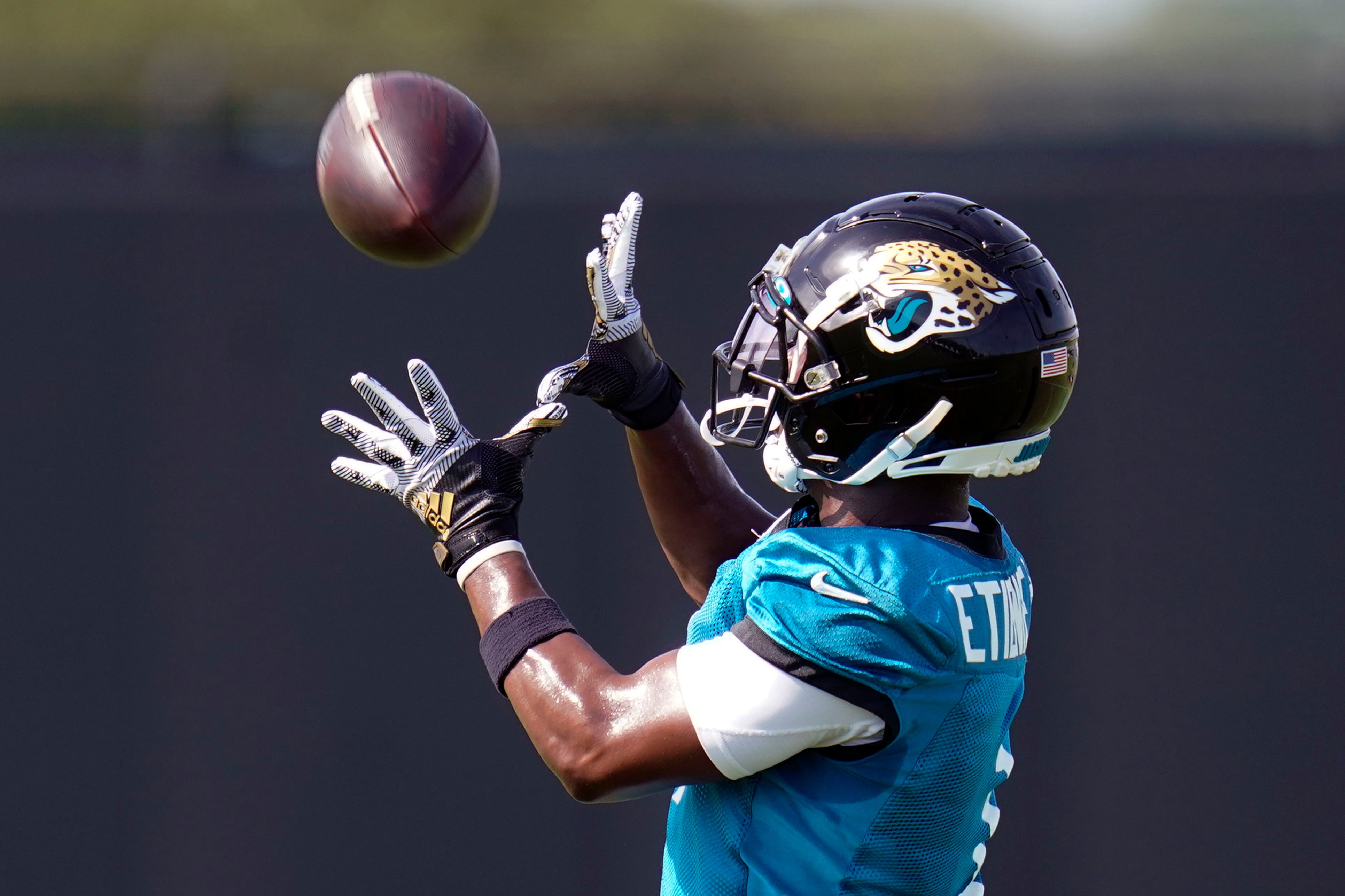 Jaguars' Travis Etienne working on 'fine-tuning my skills' in first healthy  offseason, embracing new RB additions