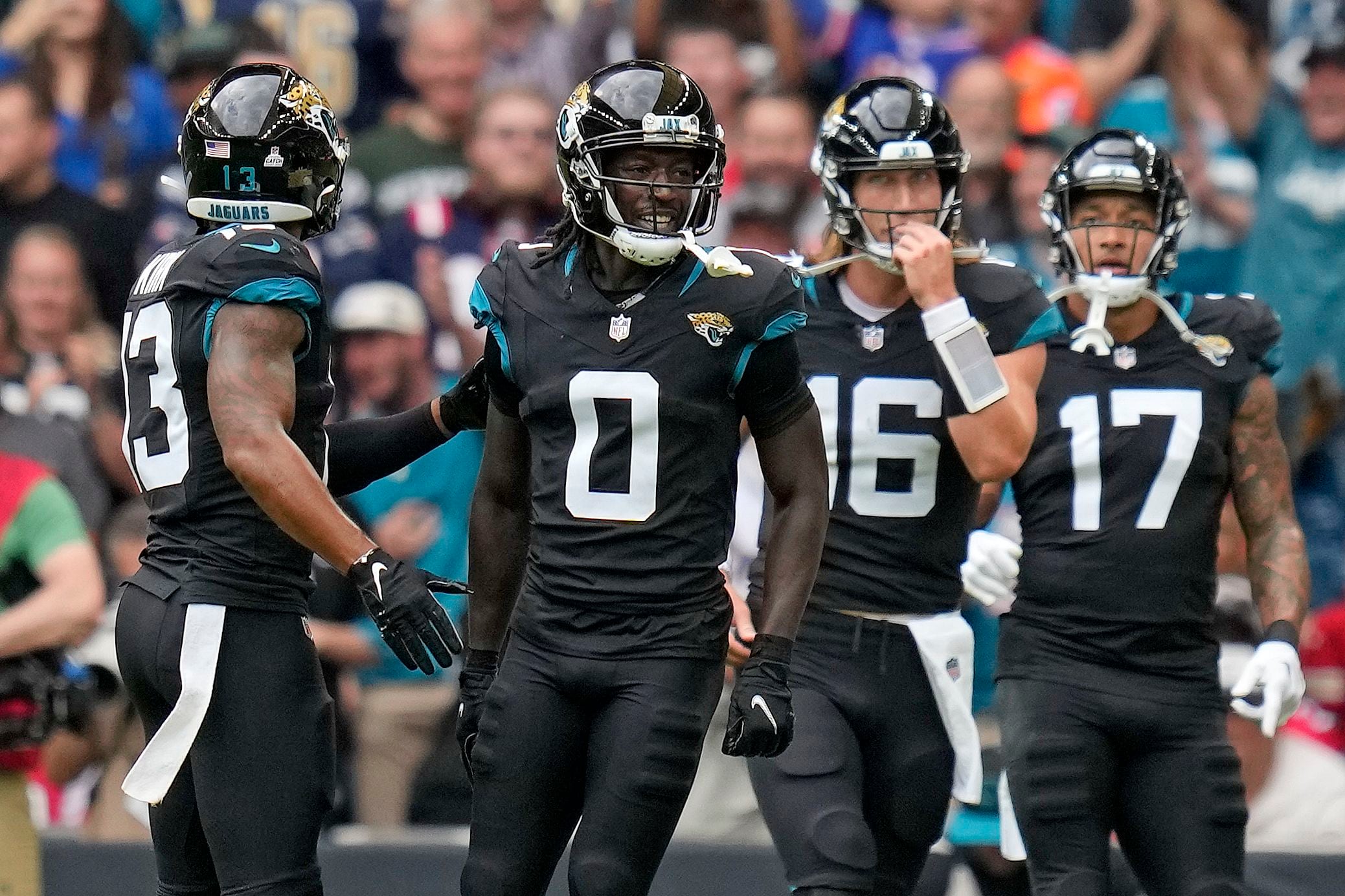 Lawrence, Ridley and defense help Jaguars beat Falcons 23-7 in London