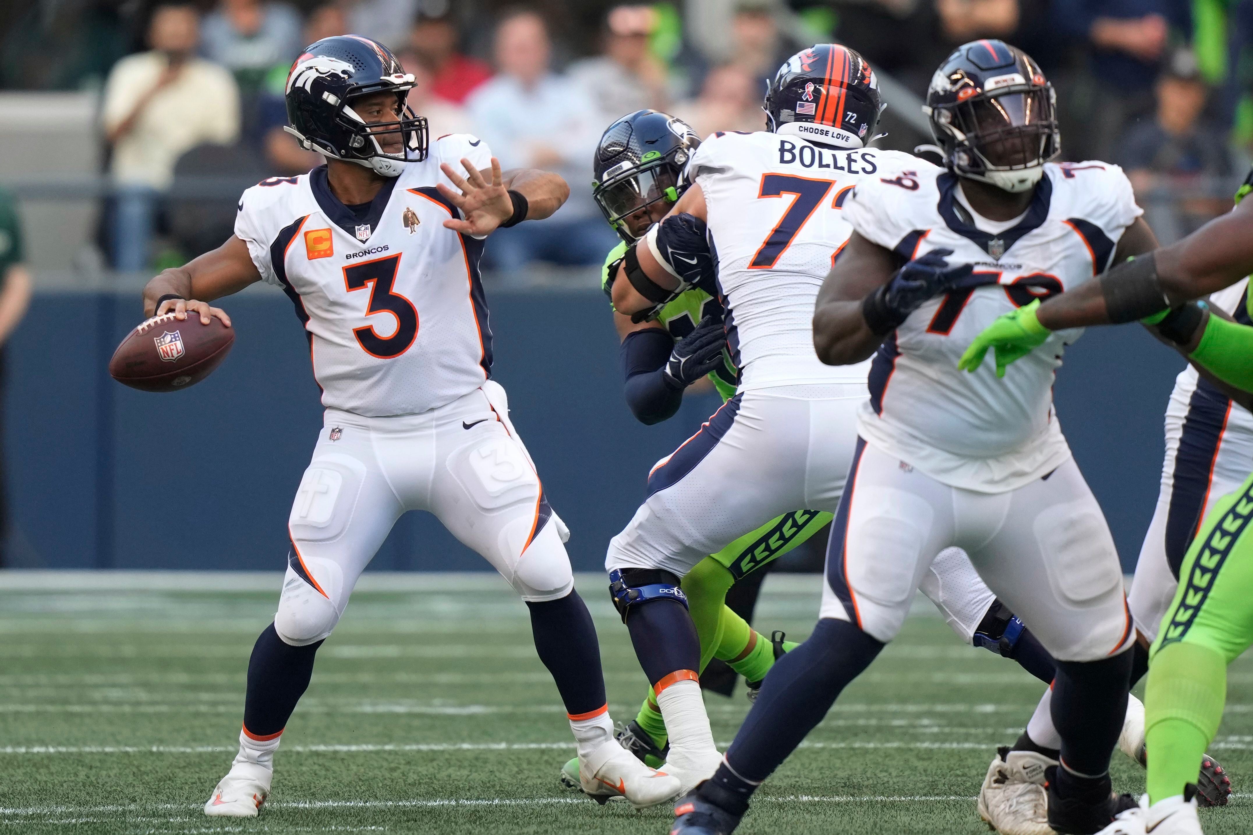 Seahawks survive Wilson's return, edge Broncos on missed FG