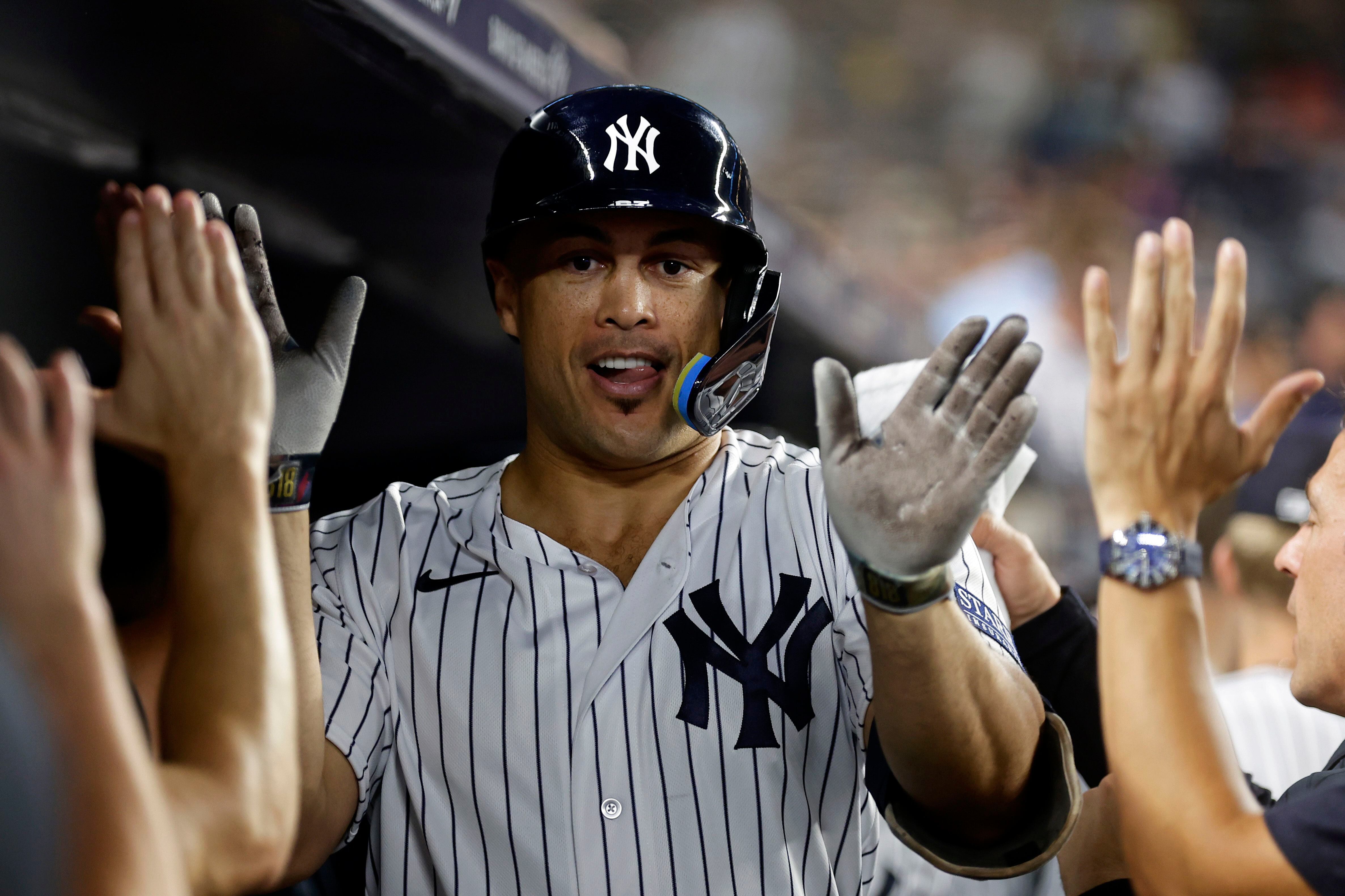 Stanton hits his 400th home run to lead Cole and the Yankees to a 5-1  victory over the Tigers