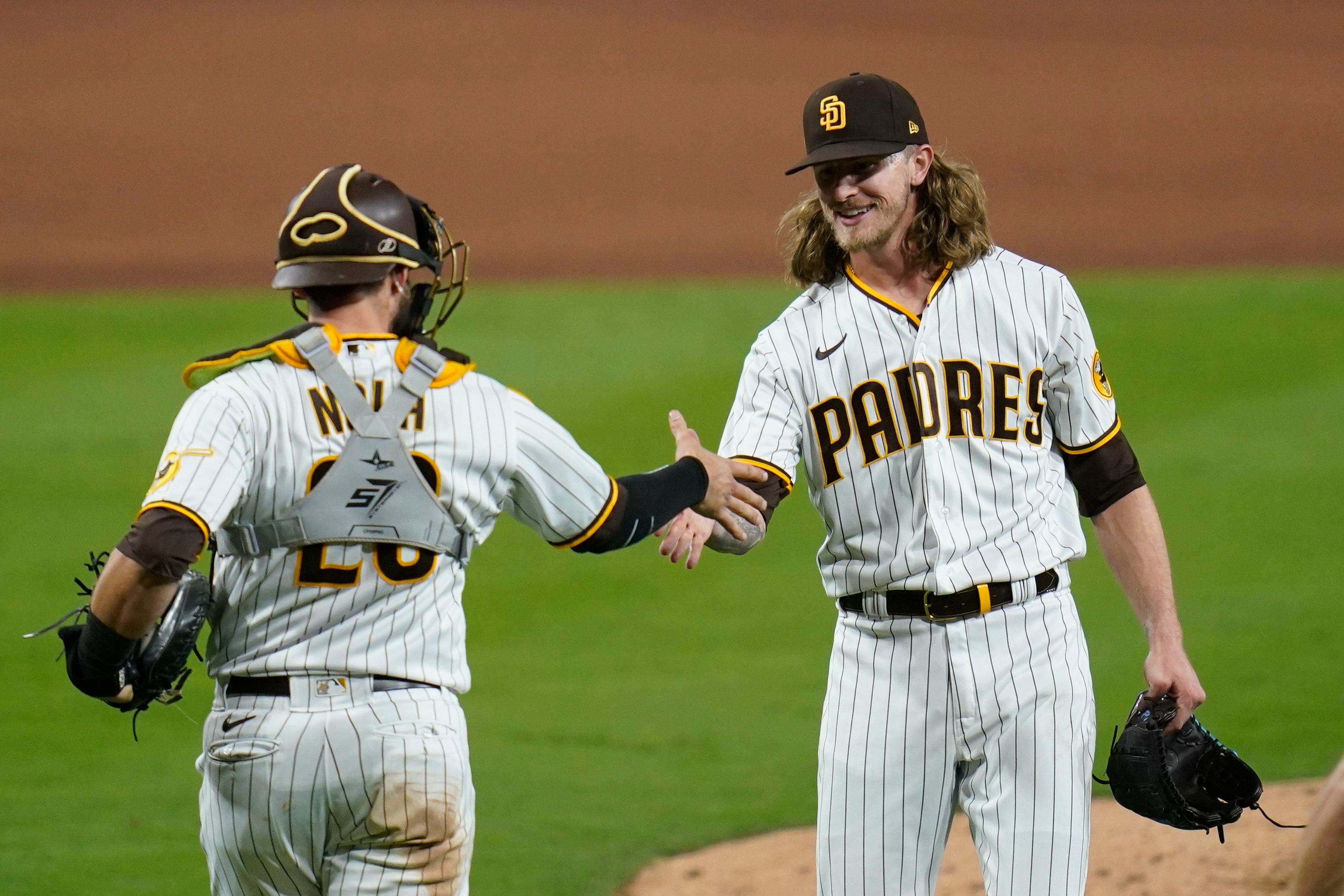 San Diego Padres' Trent Grisham reacts after hitting a home run during the  fourth inning in Game 3 of a baseball NL Division Series against the Los  Angeles Dodgers, Friday, Oct. 14