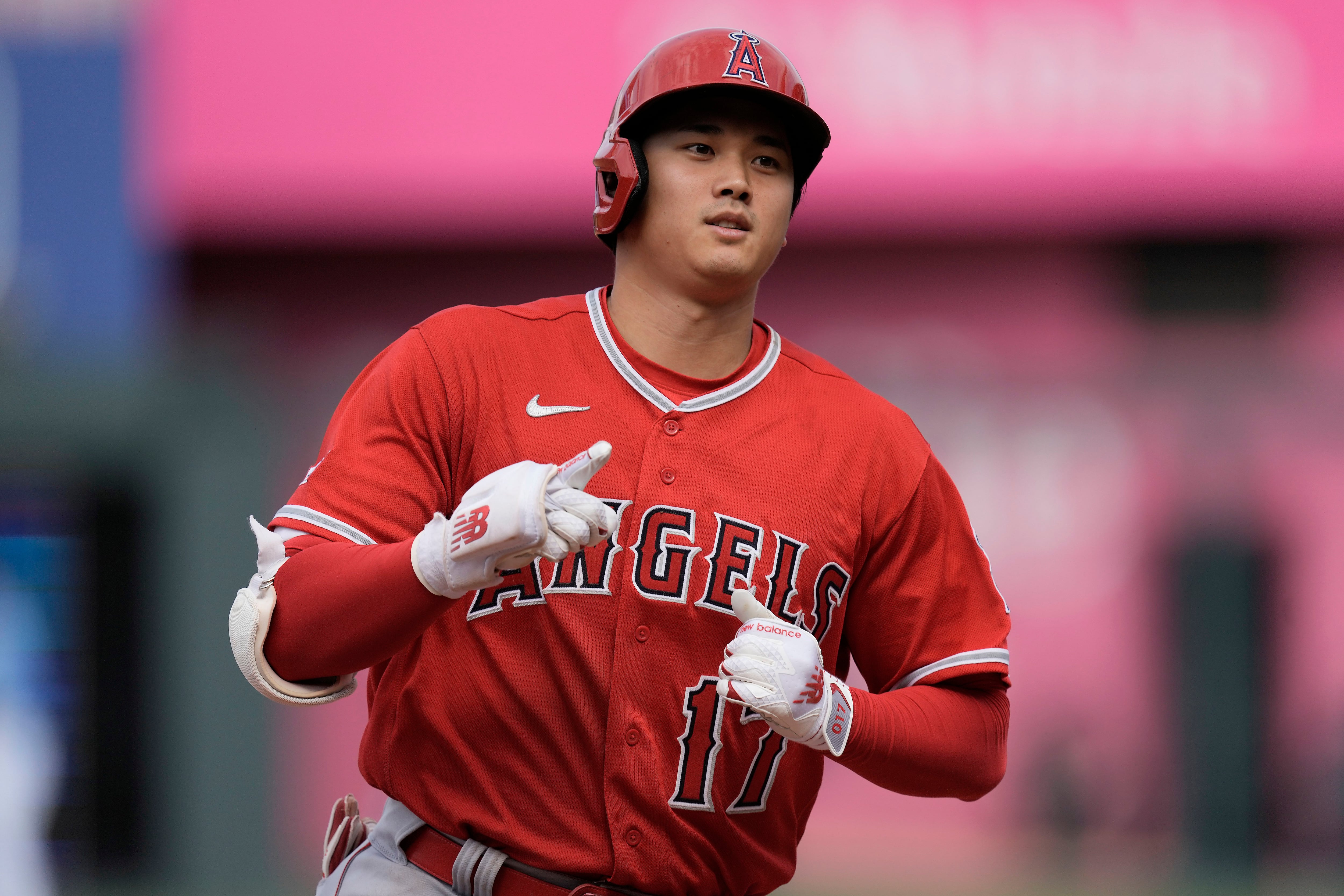 Mike Trout of the Los Angeles Angels prepares to put on a samurai
