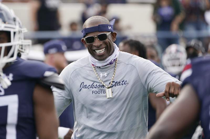 Deion Sanders makes most of rival coach's comments about him always wearing  sunglasses and a hat