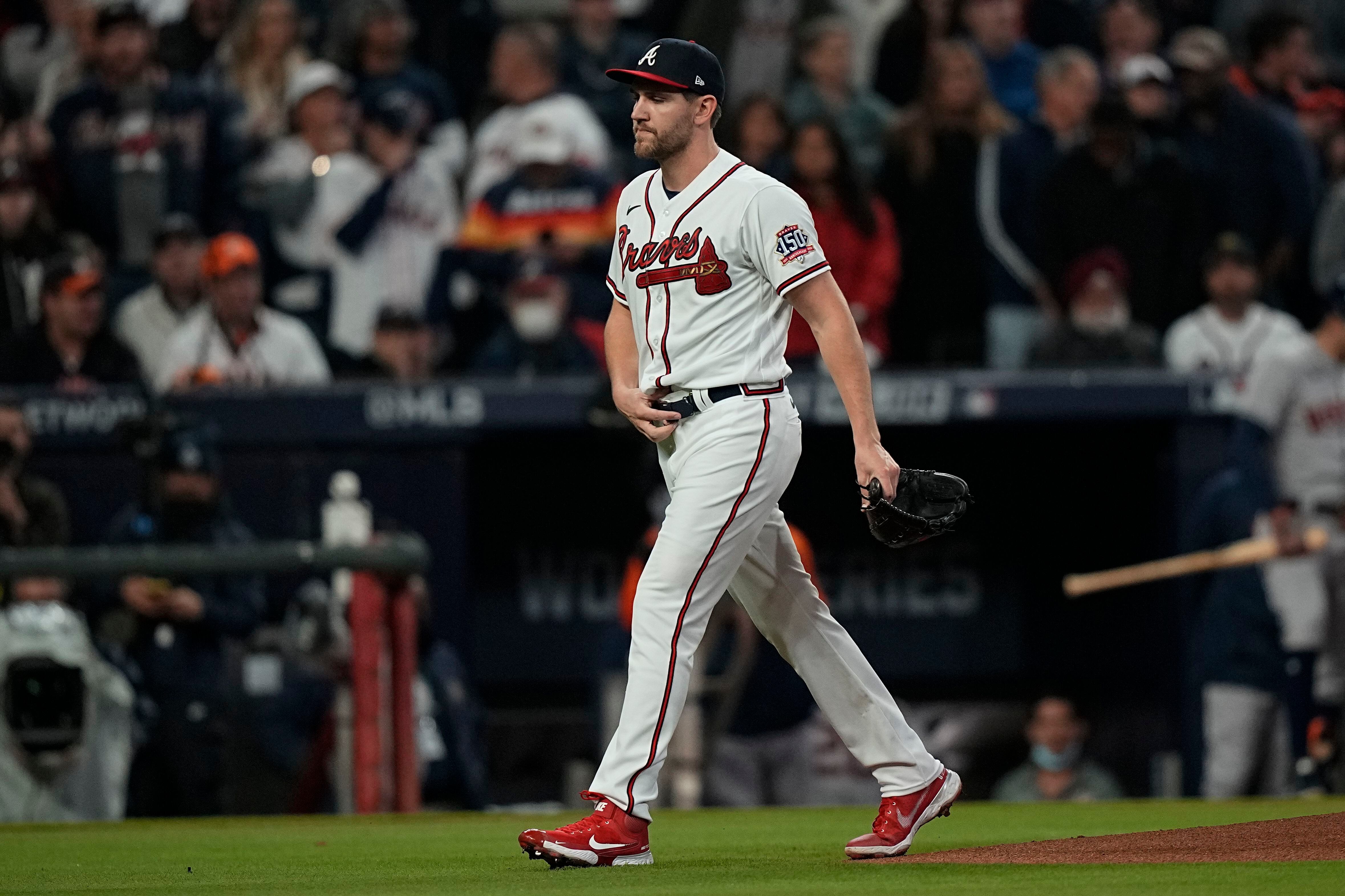 Atlanta Braves pitcher Charlie Morton, right, waits on the mound