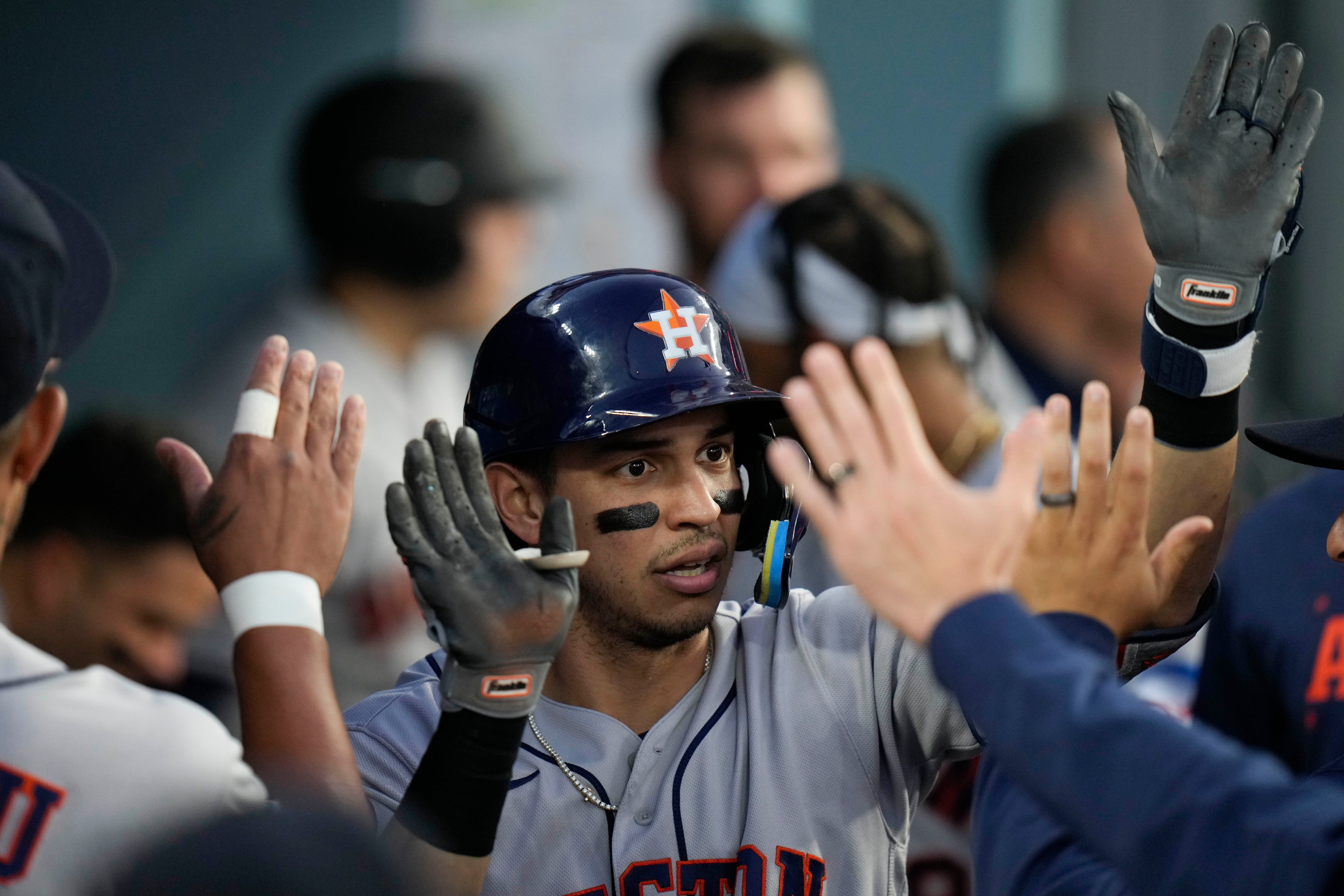 Dodgers edge defending champion Astros 3-2 as LA fans rain down