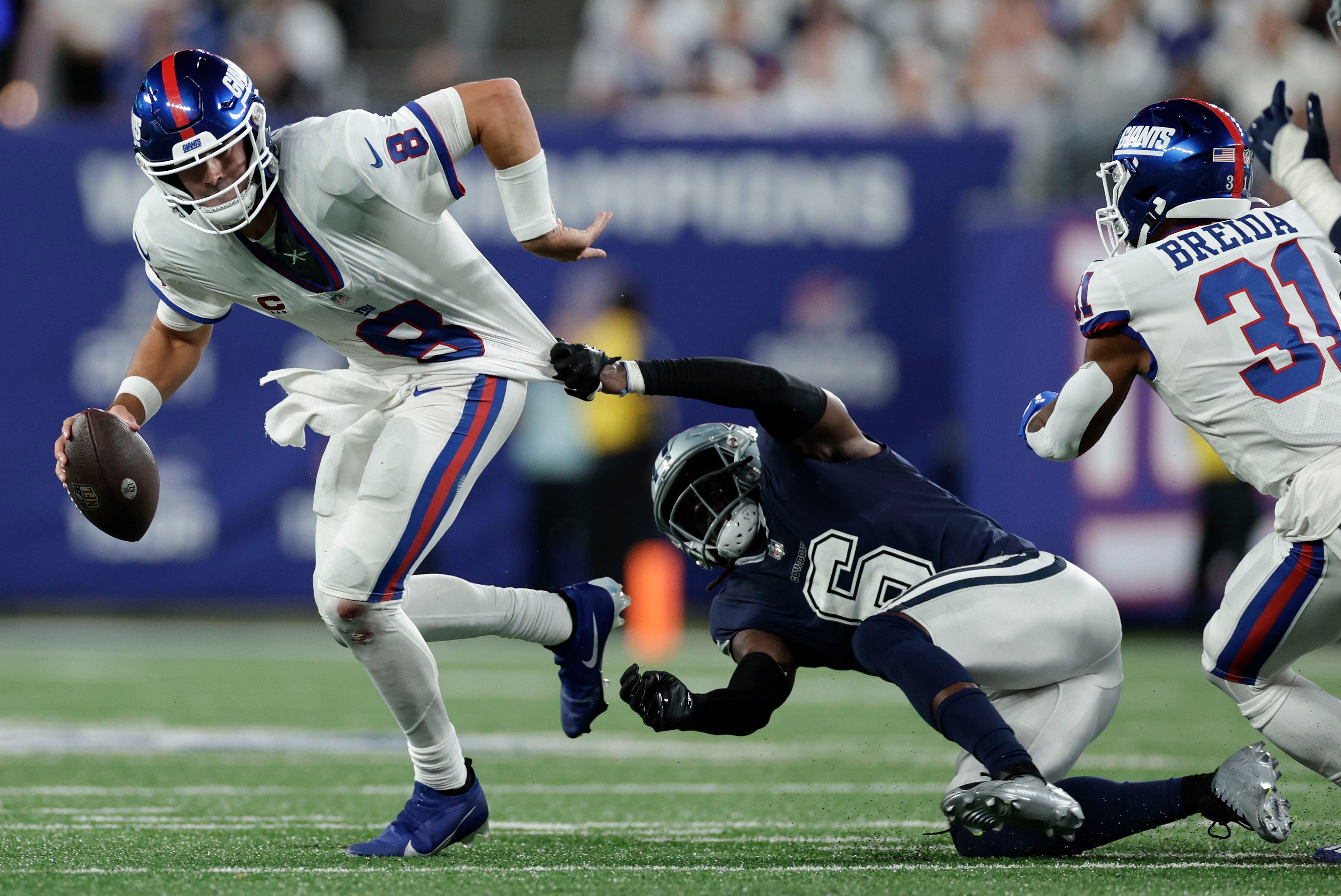 Giants take 2 body blows from Cowboys, a loss and injury