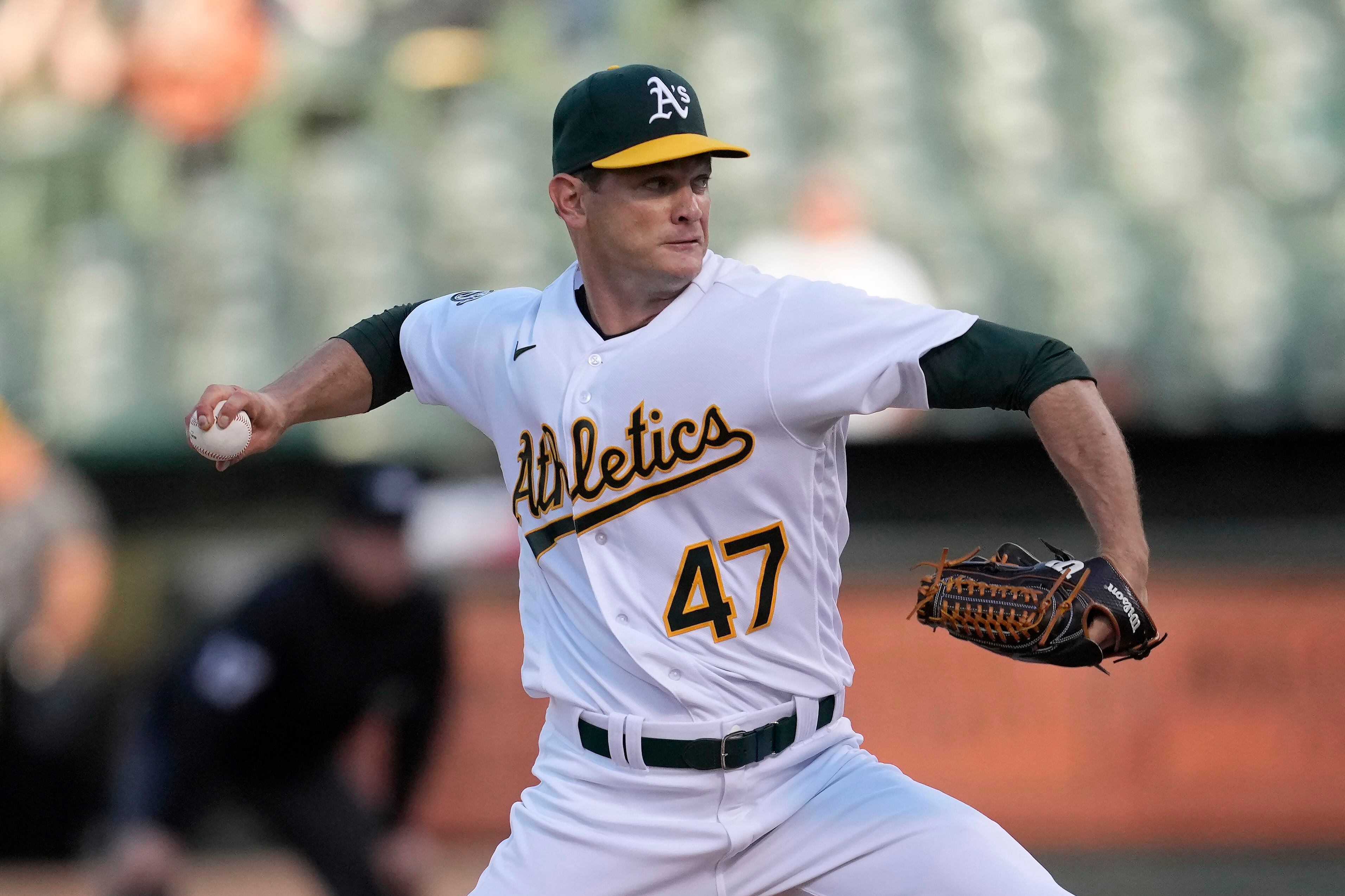 A's met by fans in Oakland with chants of `Sell the team!