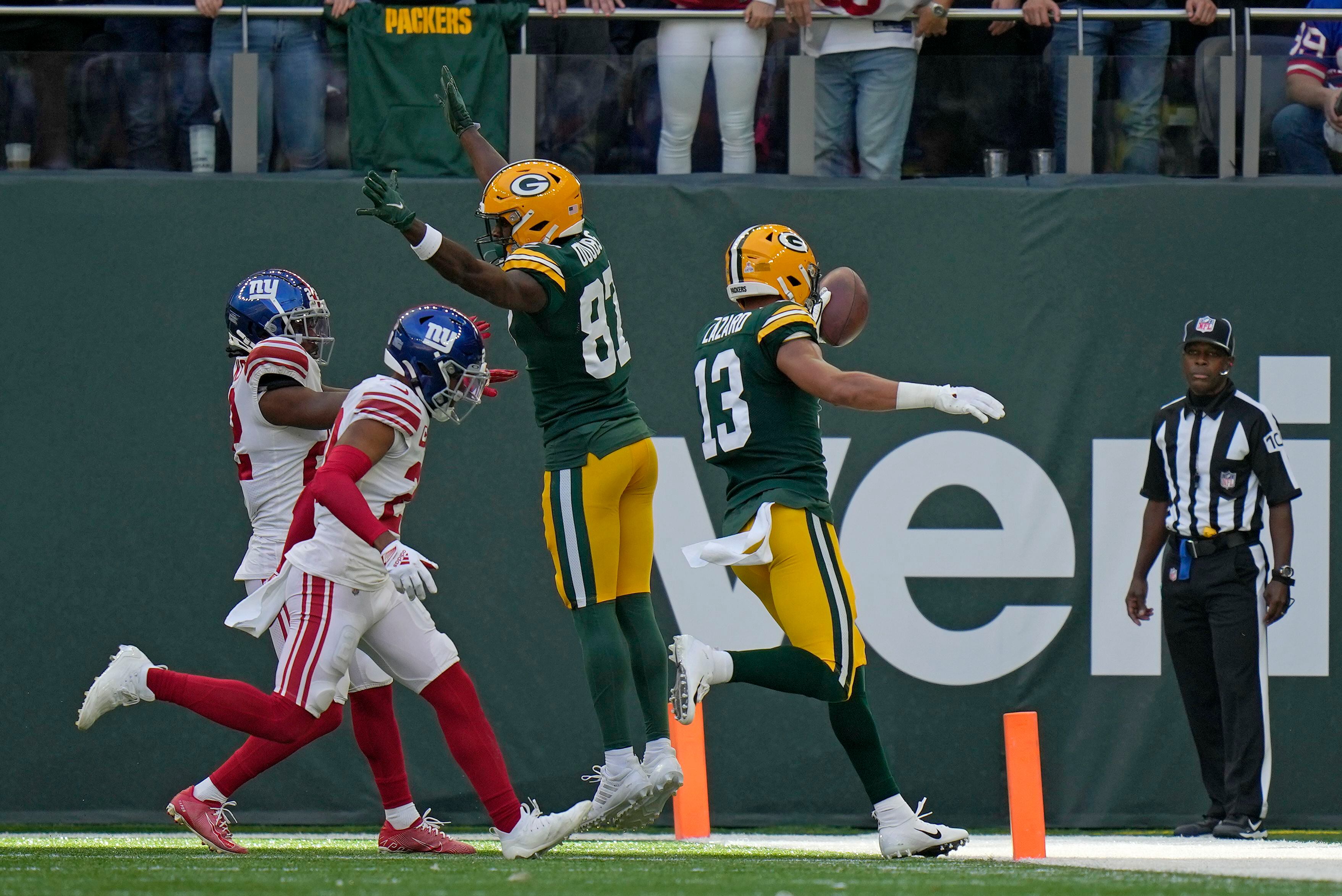 New York Giants running back Gary Brightwell (23) runs up the field during  an NFL football game against the Green Bay Packers at Tottenham Hotspur  Stadium in London, Sunday, Oct. 9, 2022.