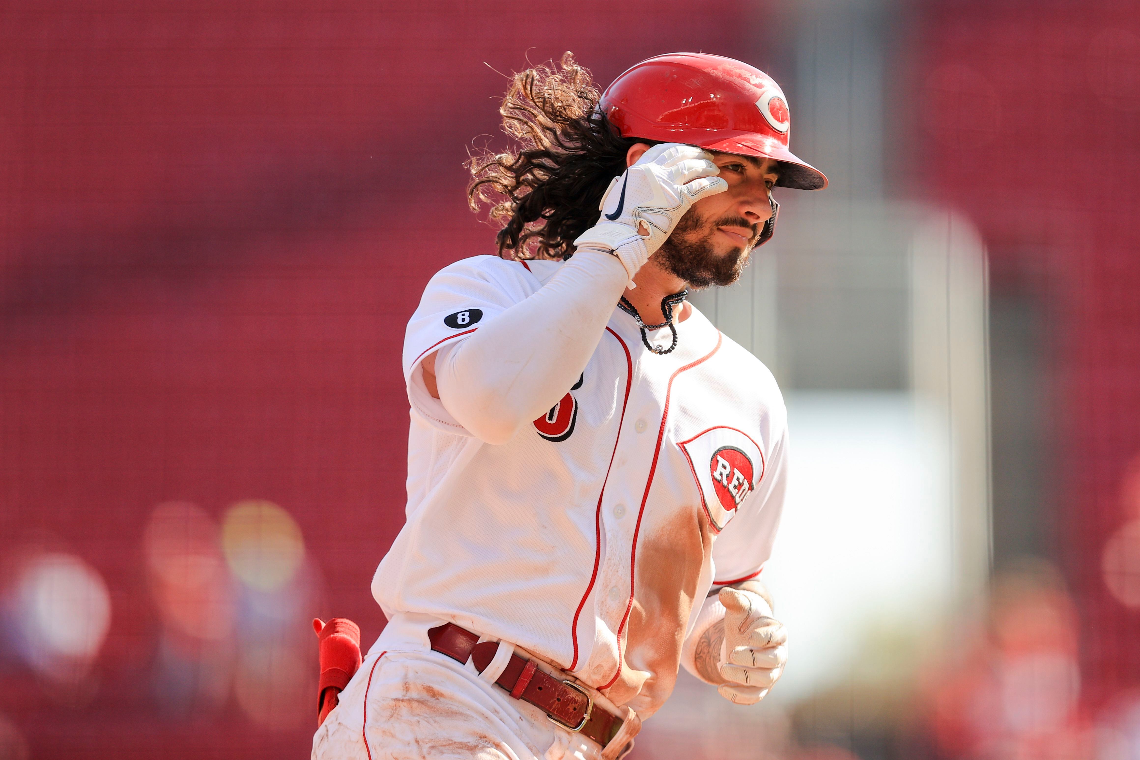 Votto helps Reds beat Pirates 13-1 to stay in playoff race – KXAN Austin