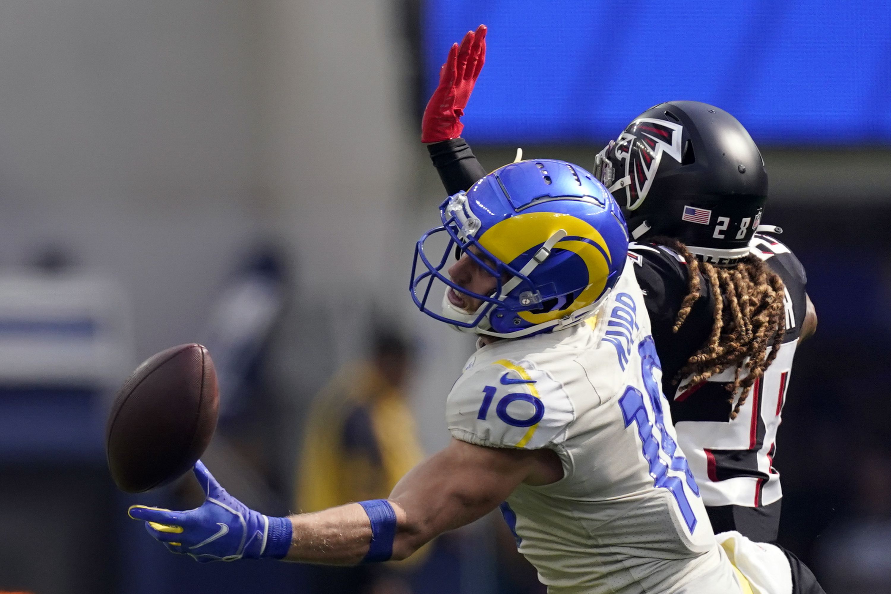 Rams stave off Falcons late rally, 31-27