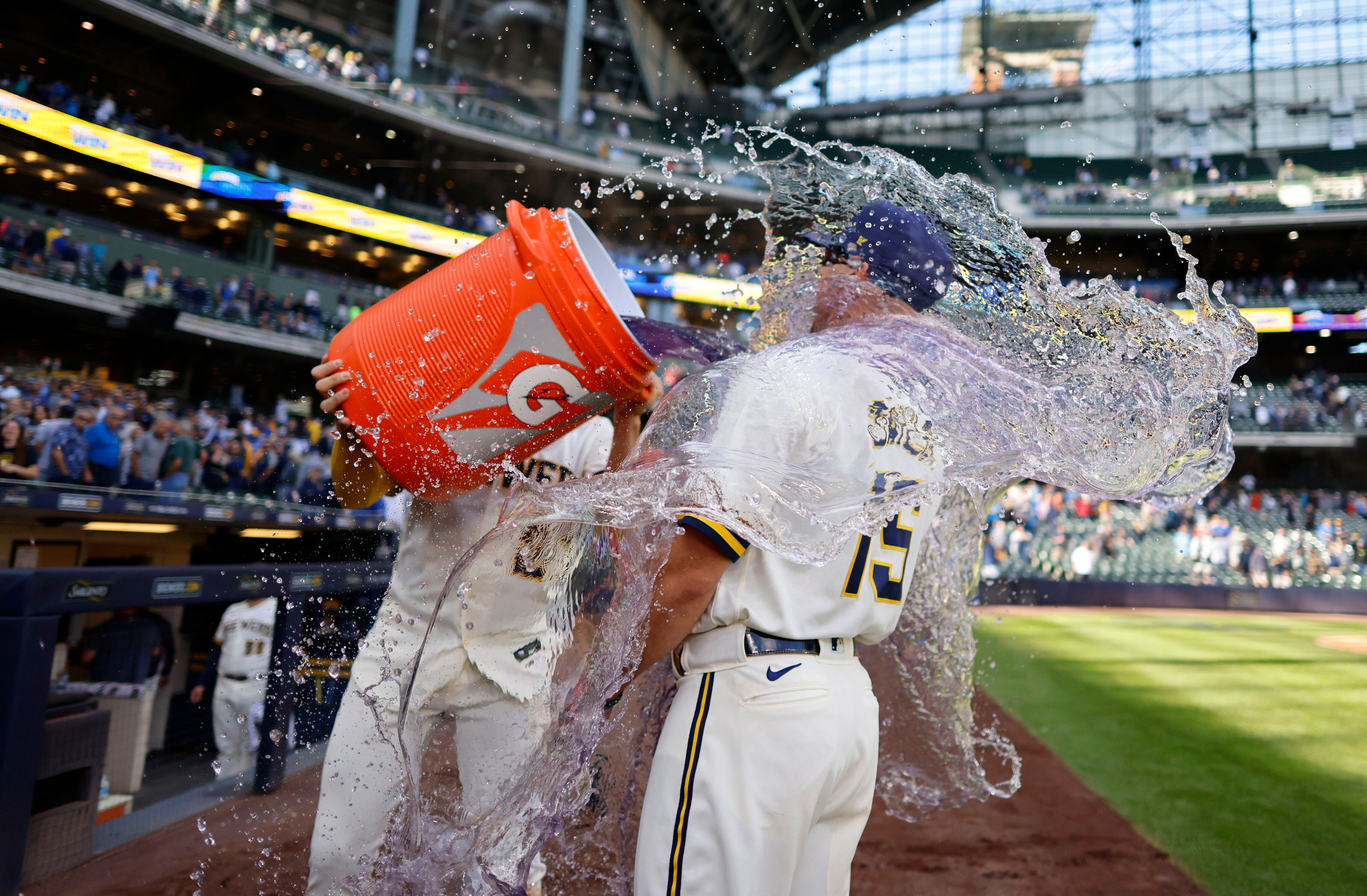 Milwaukee Brewers' Tyrone Taylor watches his three-run double off