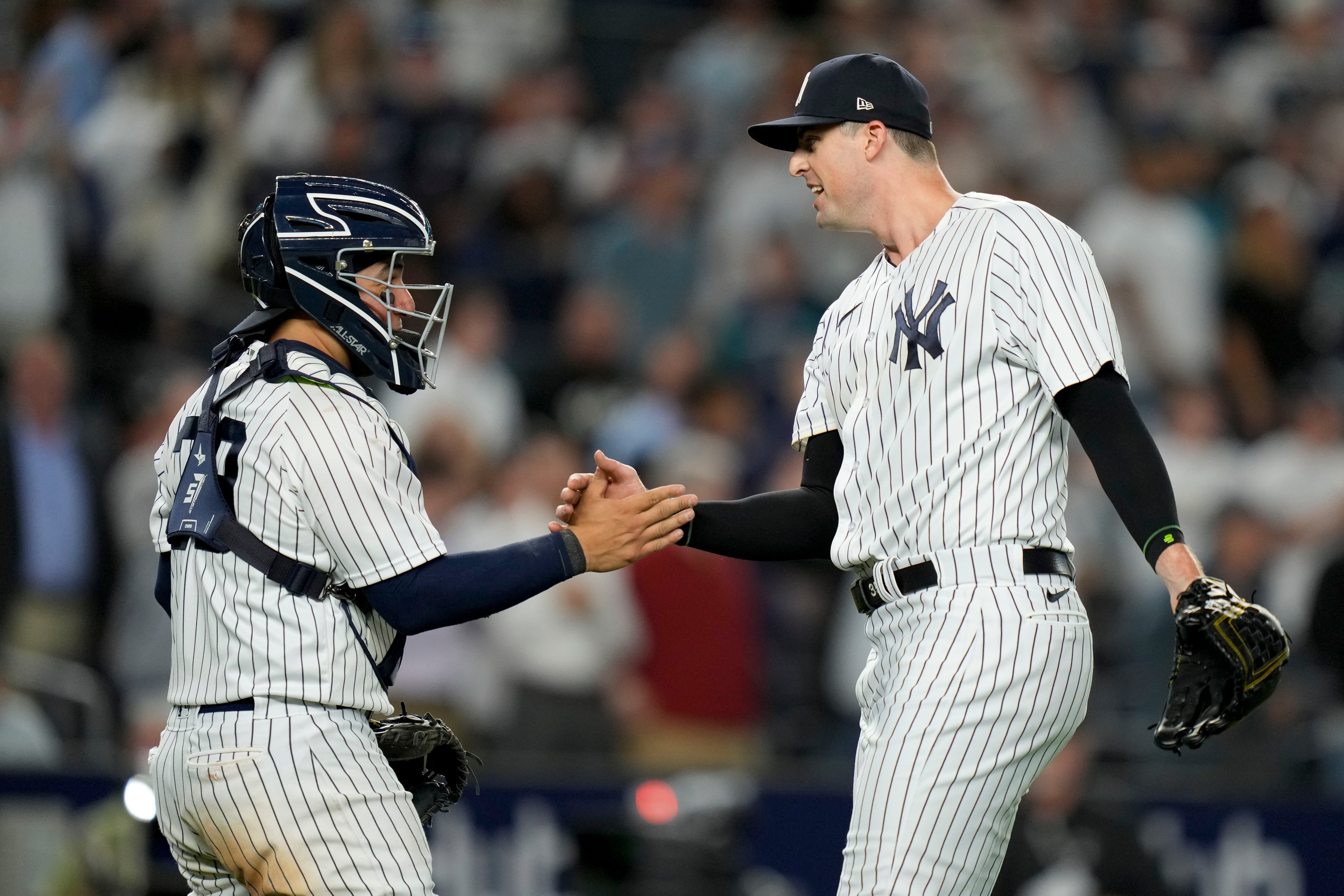 Wagging his finger at the Mariners, Cole stops the Yankees' 4-game