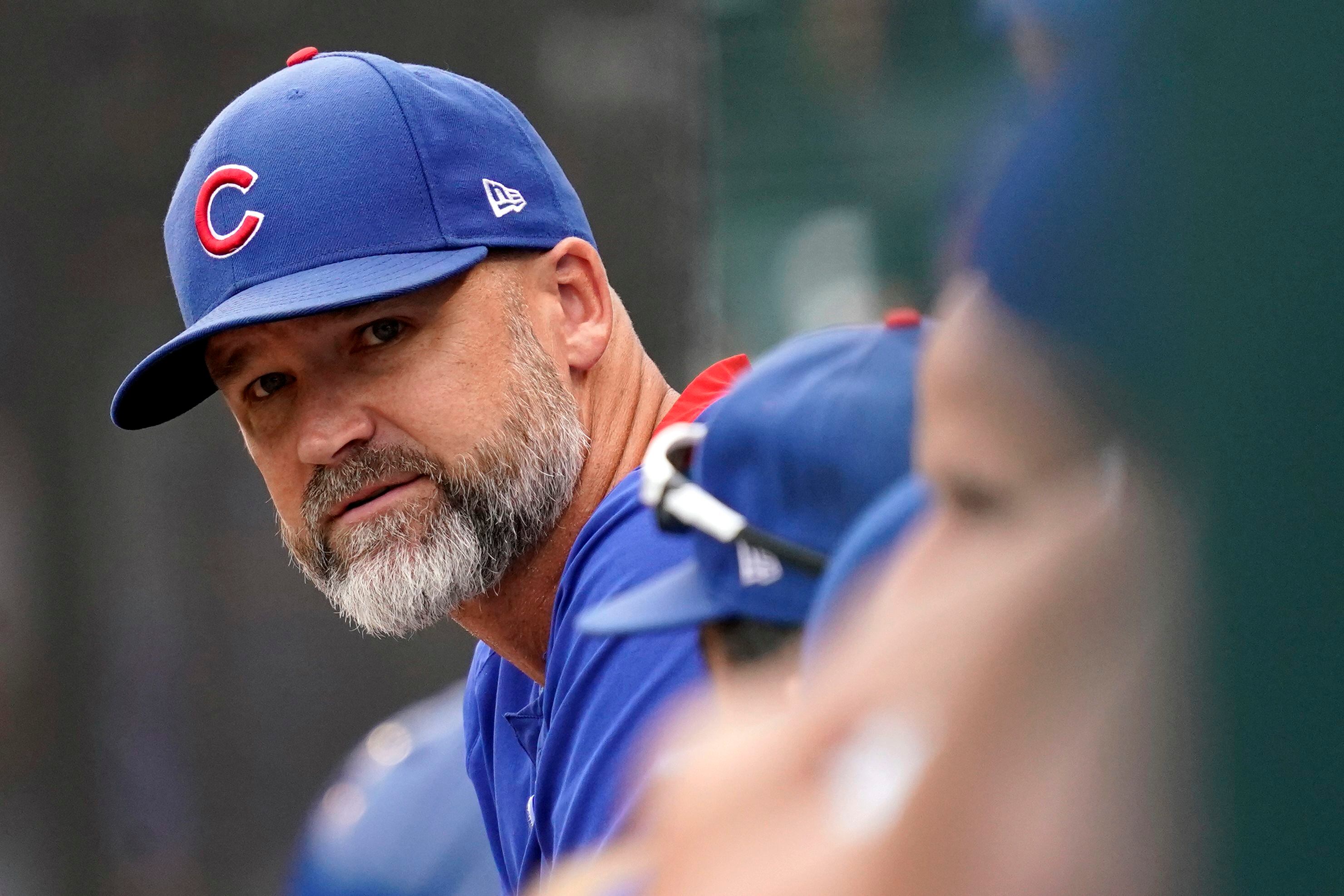 Me: Huh. They're selling a Cubs cap with an upside-down logo. Her