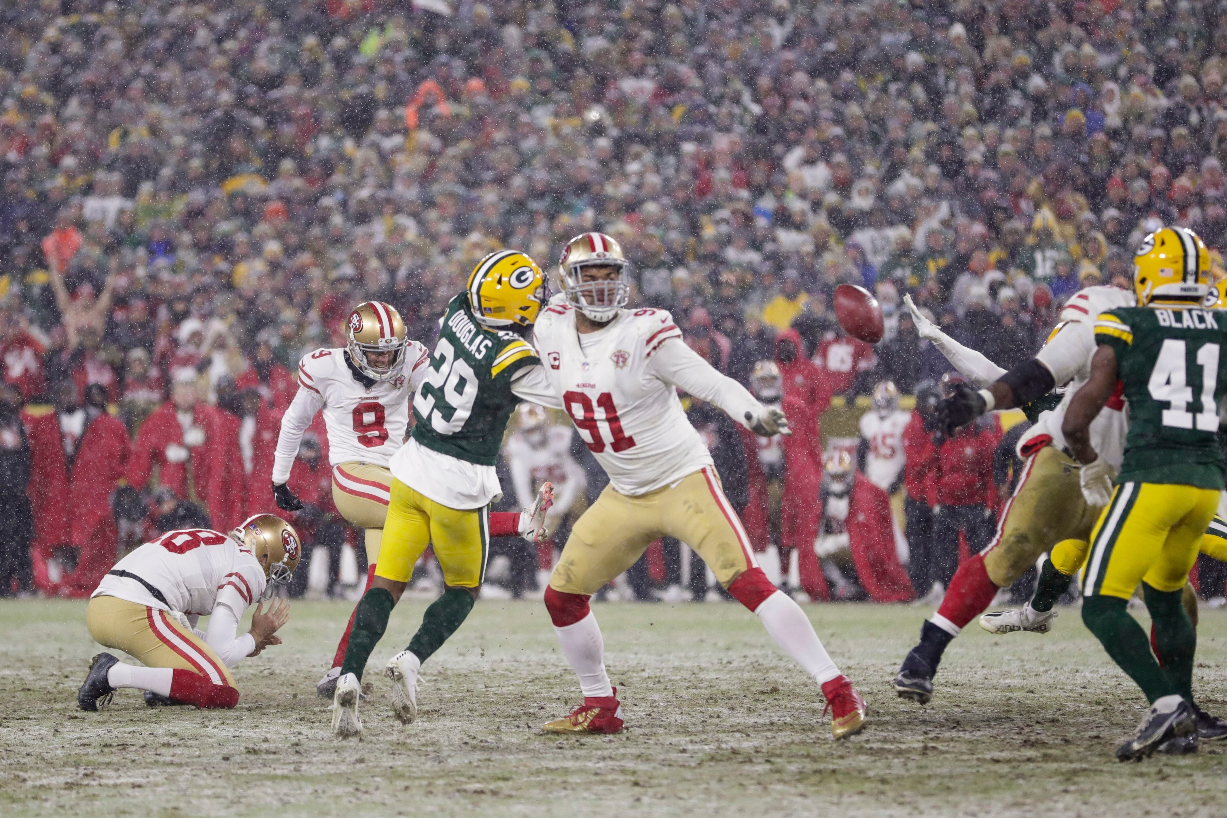 The 49ers block the punt and Hufanga picks it up for a touchdown to tie the  game against the Packers : r/sports