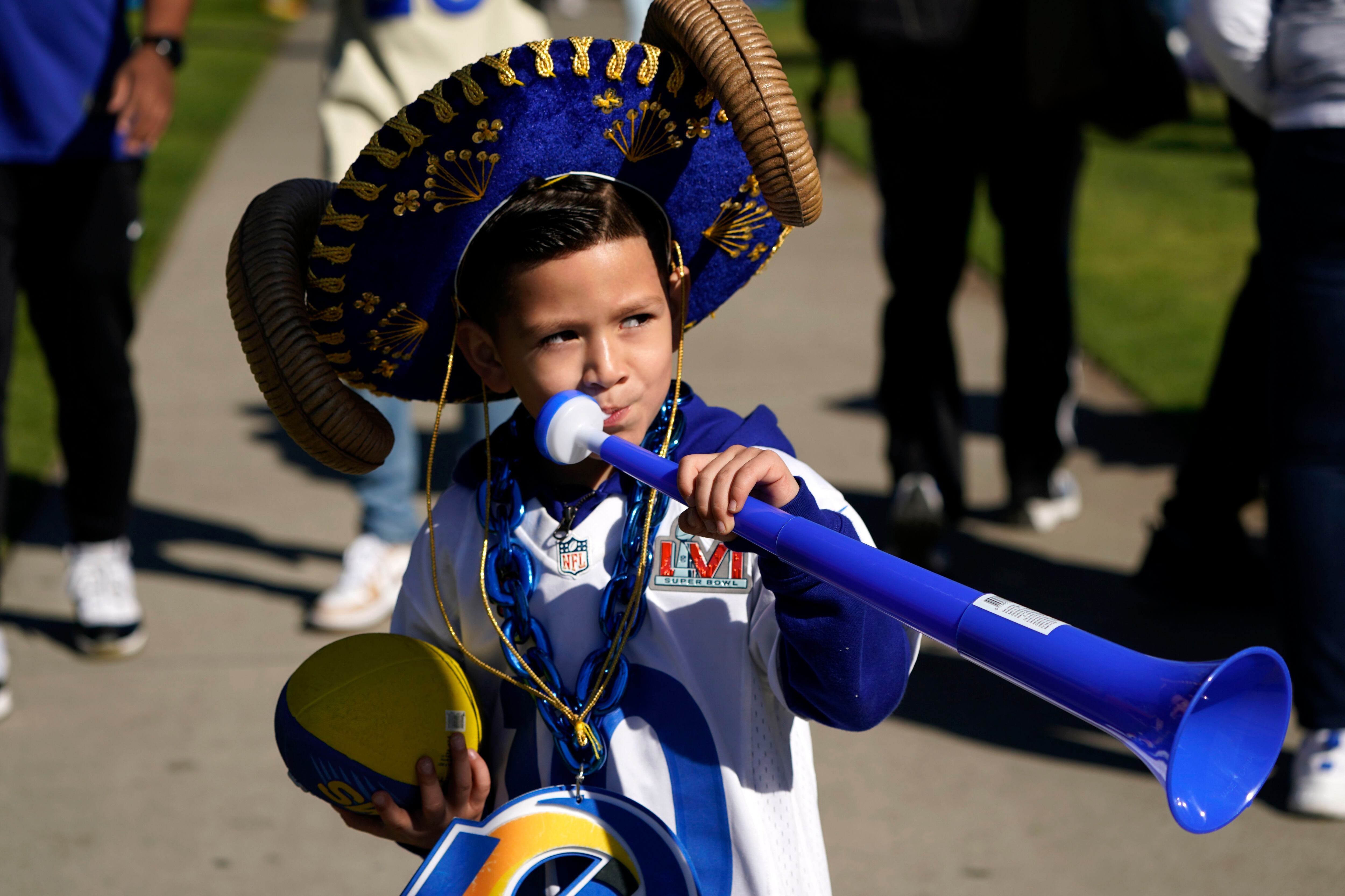 Whose House? Thousands cheer as Rams celebrate victory with parade, rally  at Coliseum