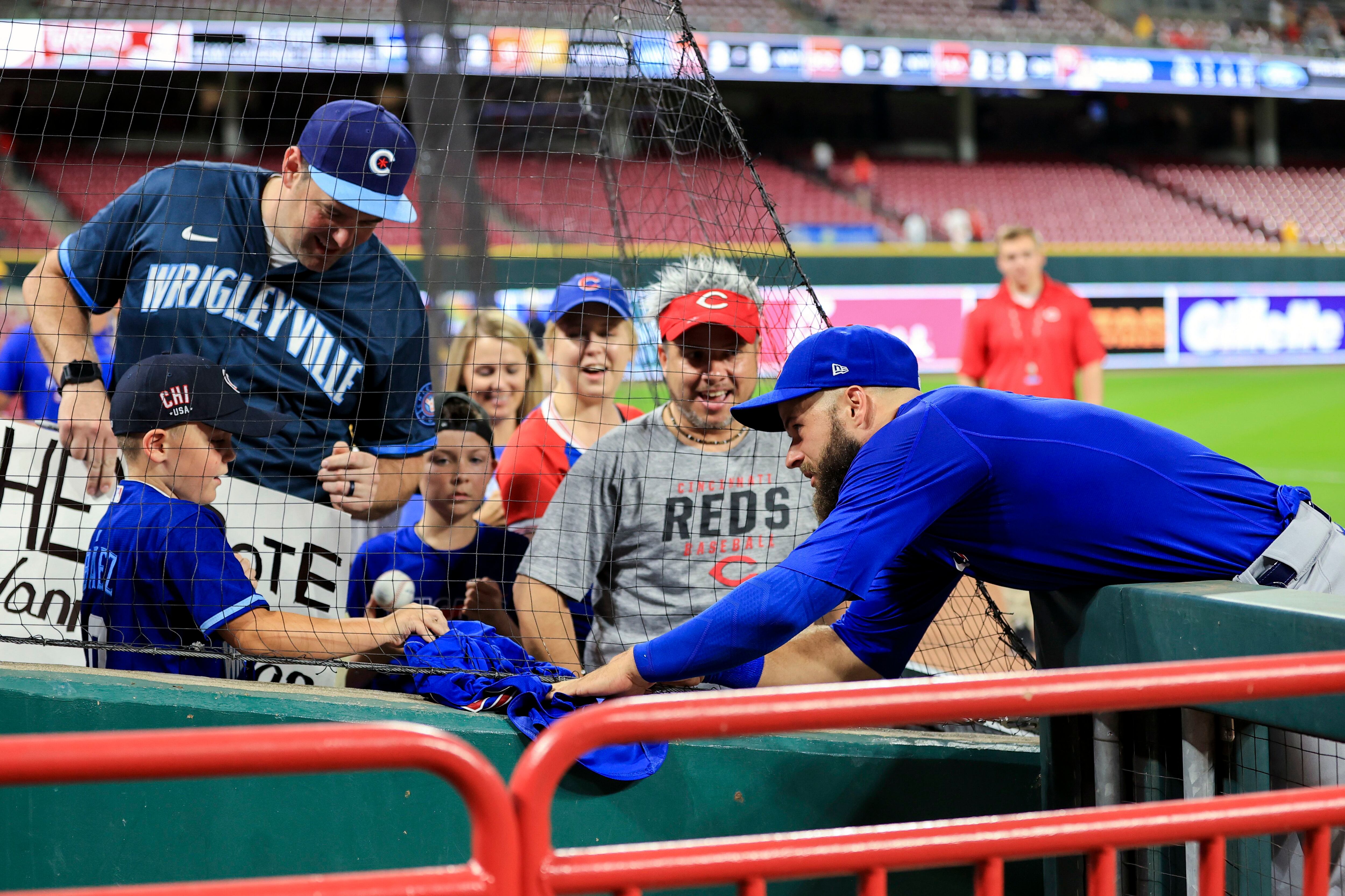 Depleted Cubs quiet playoff-contending Reds again, win 7-1