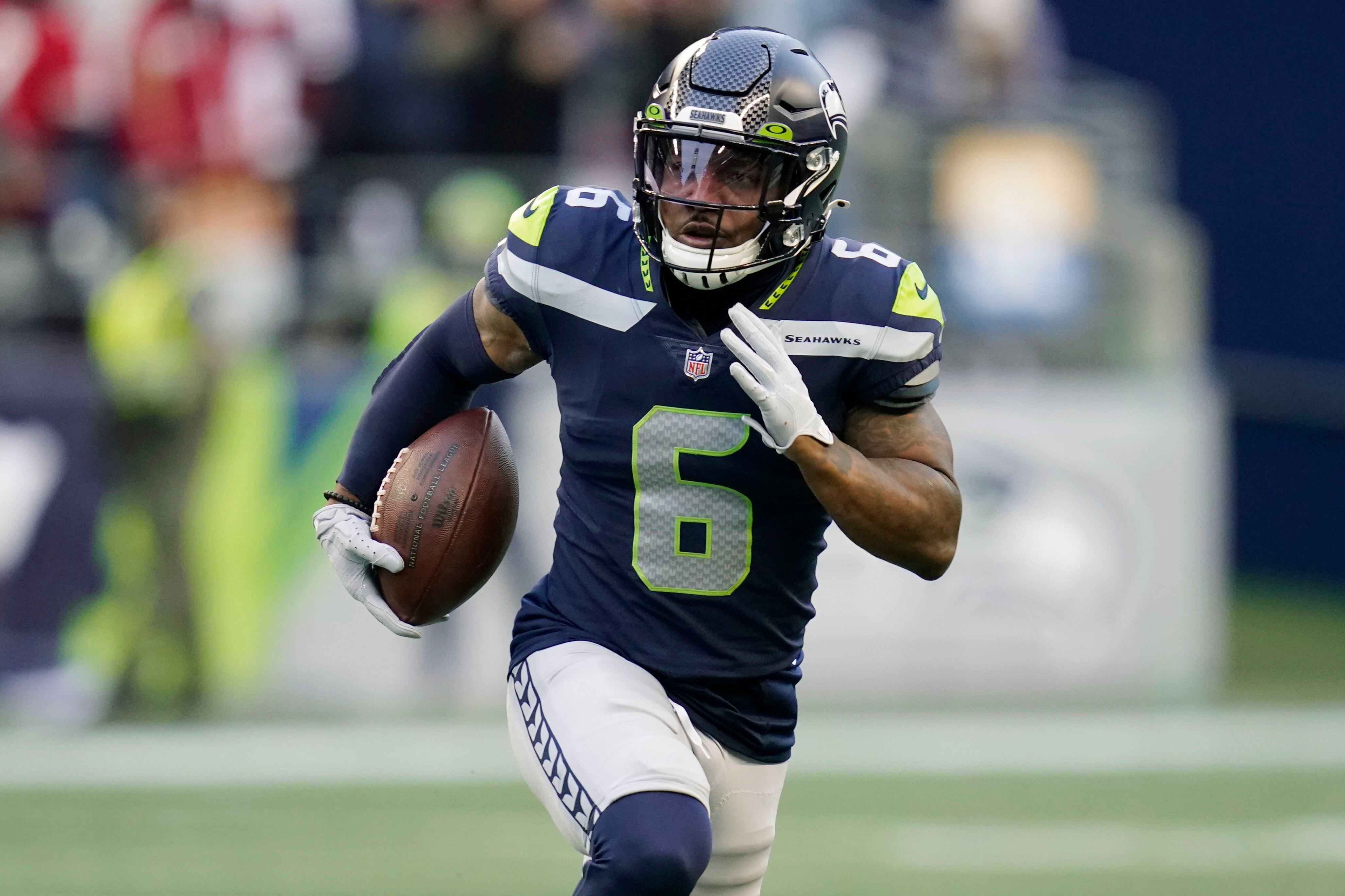 Seahawks hold on late for wild 30-23 win over 49ers