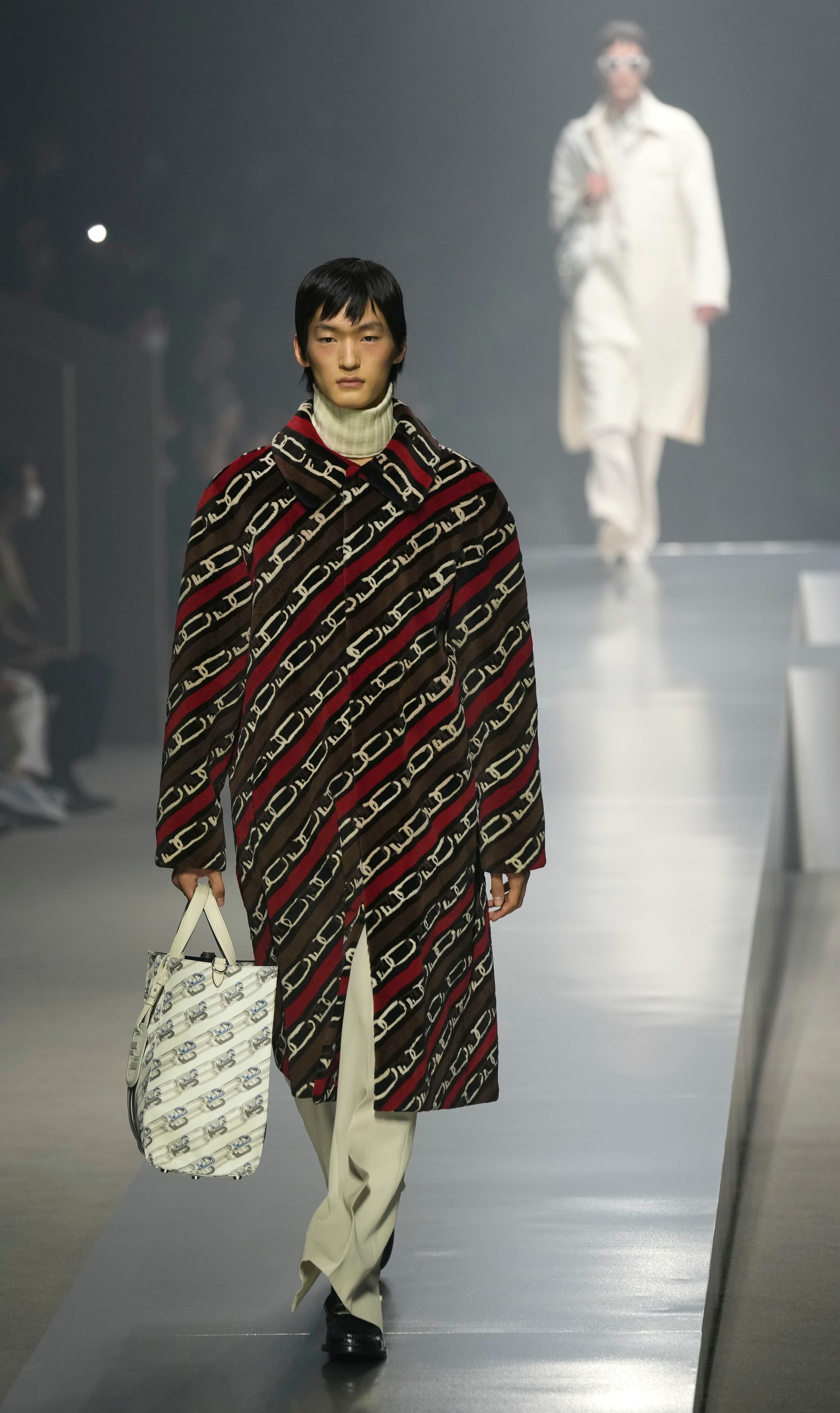 Milan Men's Fashion Week 2022: Is Fendi levelling up the gender-bending  menswear trend? The luxury fashion maison brought boundary-defying feminine  silhouettes to its autumn/winter show