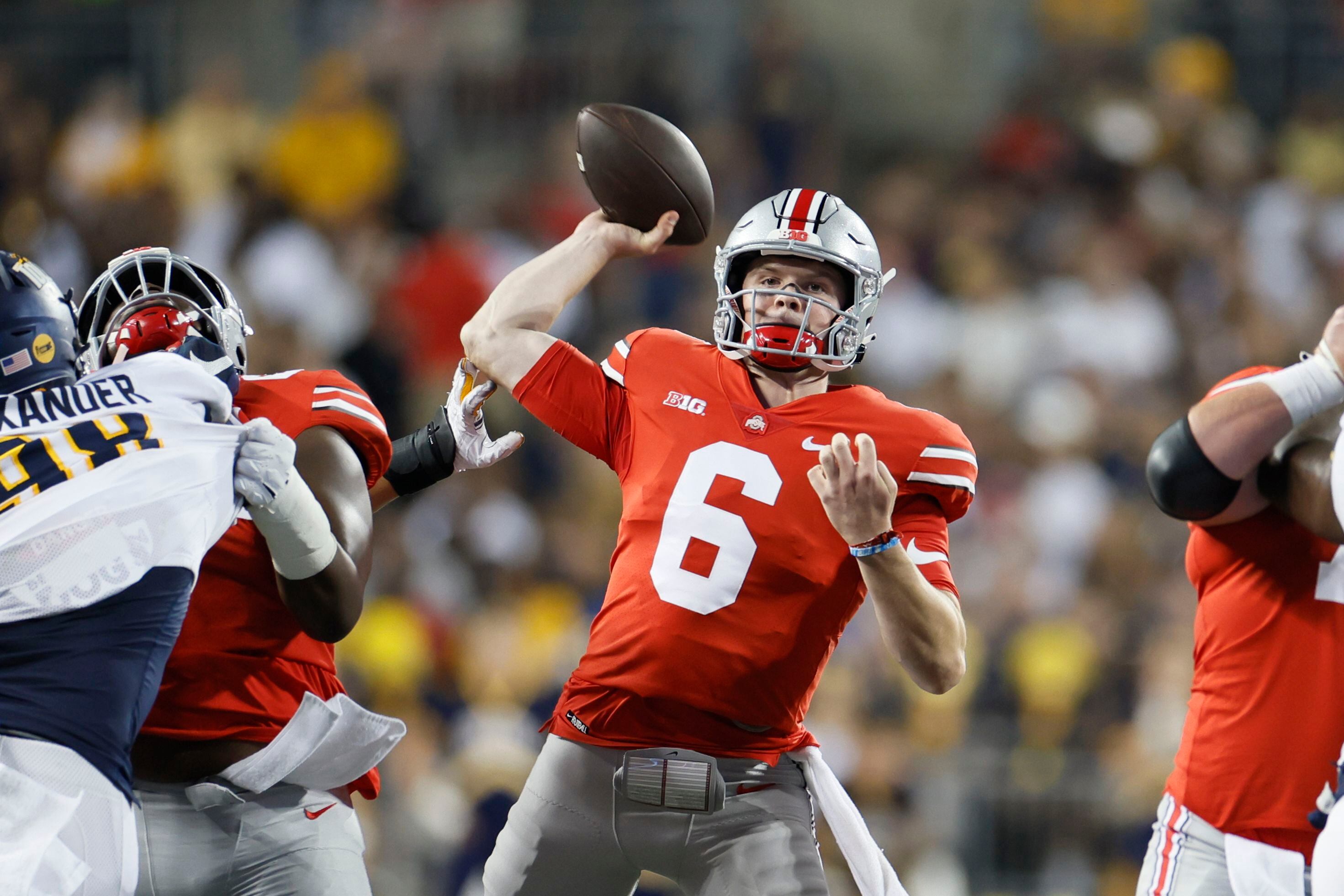 Quarterback C.J. Stroud of the Ohio State Buckeyes takes the field